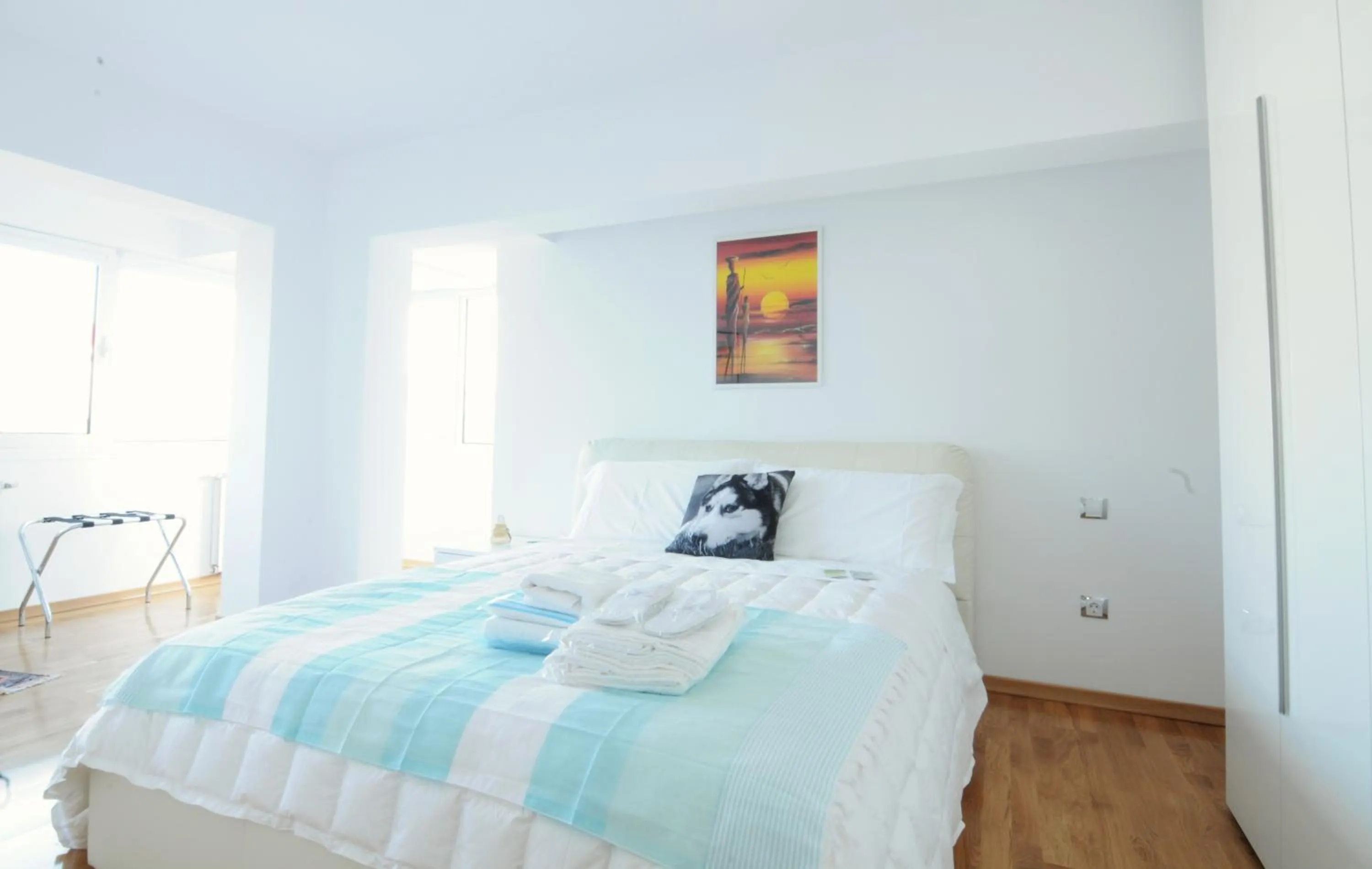 Bed in White Dream Suites