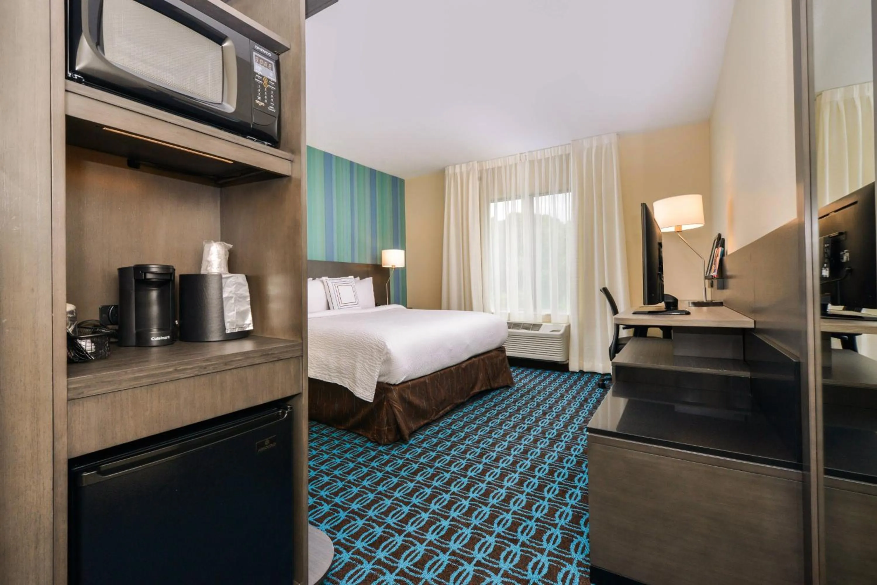 Photo of the whole room, Bed in Fairfield Inn & Suites by Marriott Raleigh Cary