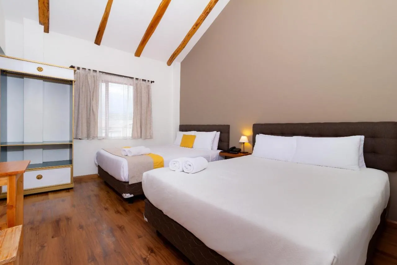 Quadruple Room with Terrace - single occupancy in San Rocke House Hotel