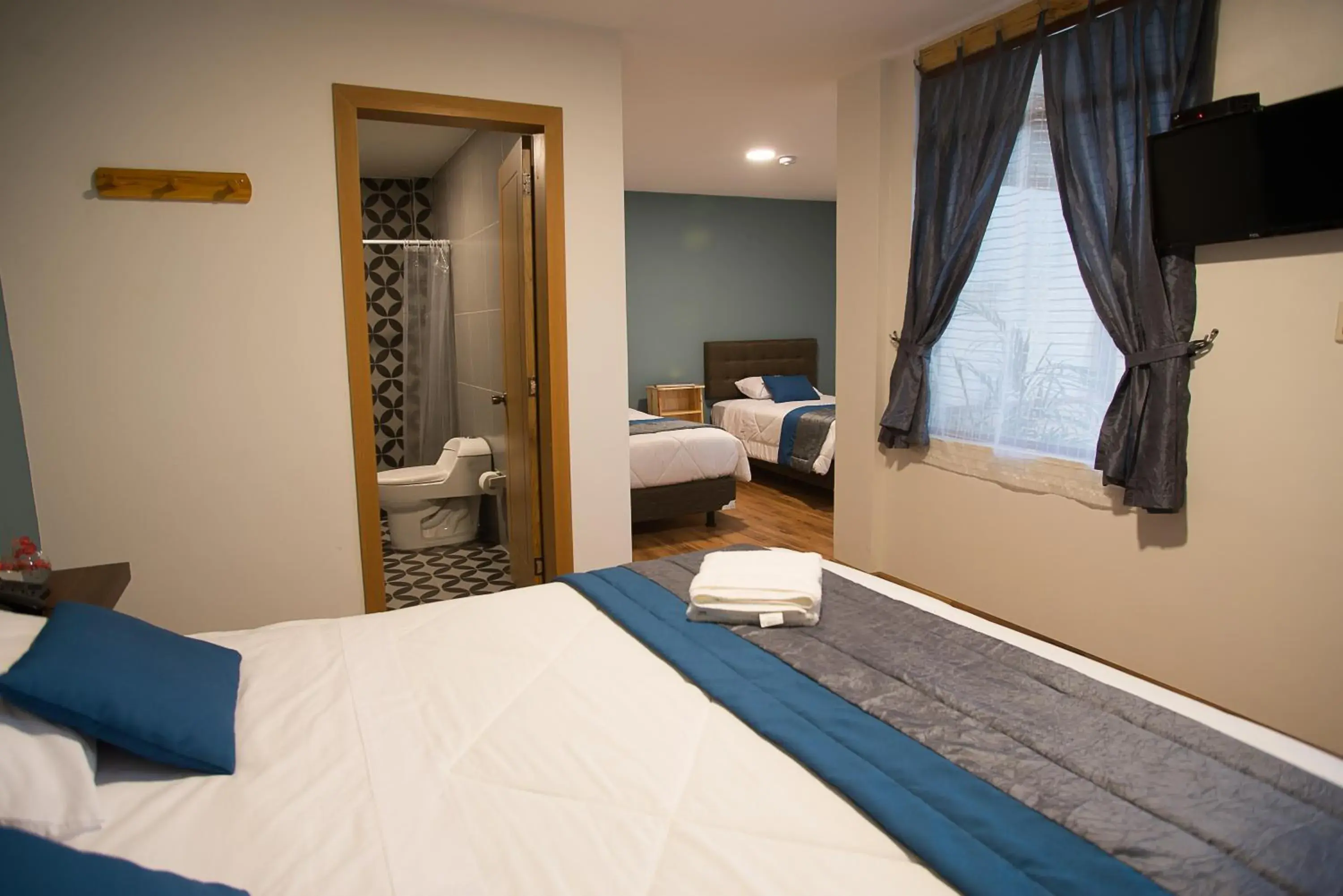 Deluxe Quadruple Room - single occupancy in San Rocke House Hotel Deluxe Quadruple Room - single occupancy in San Rocke House Hotel