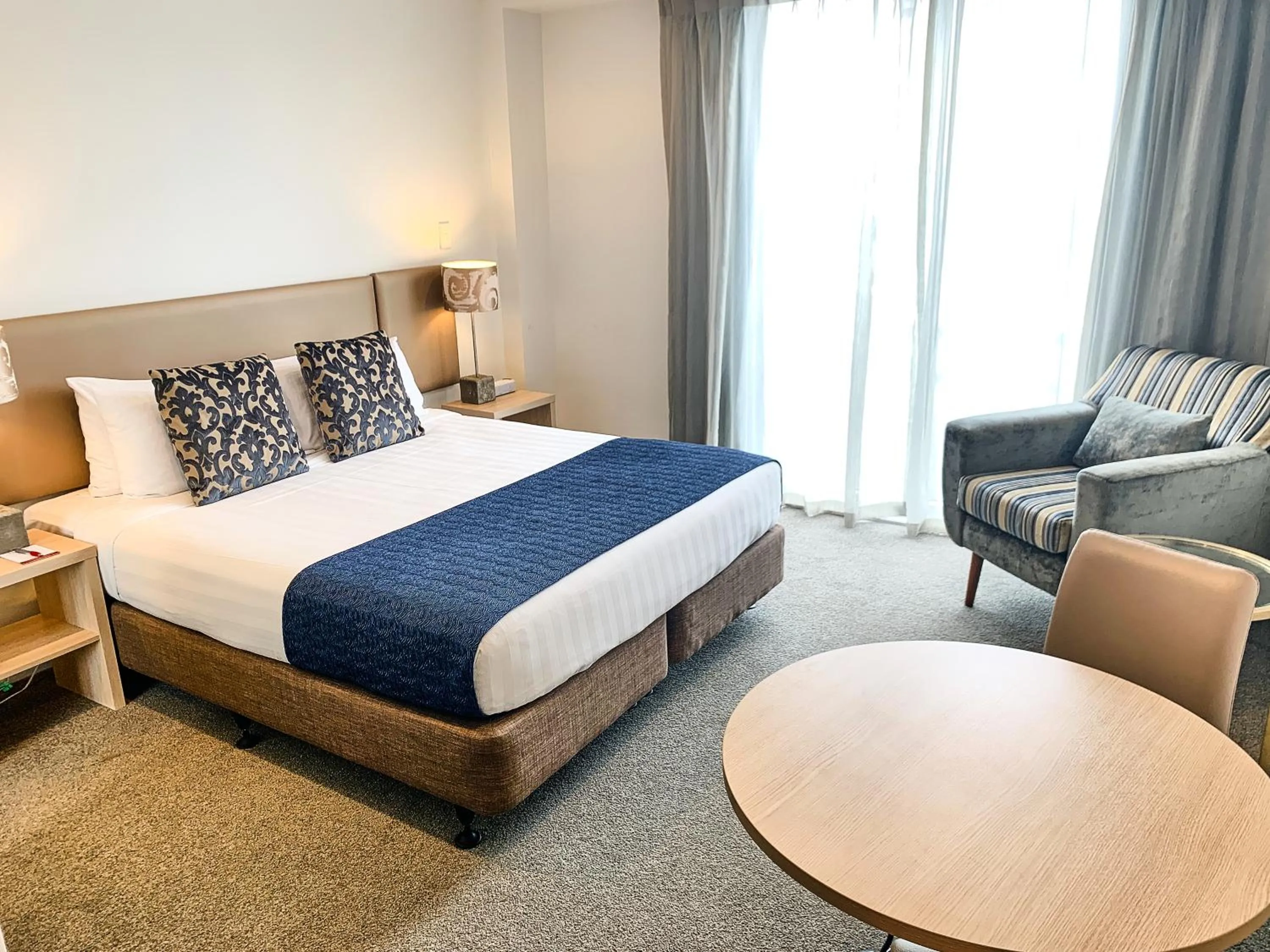 Bed in Ramada Suites by Wyndham Albany