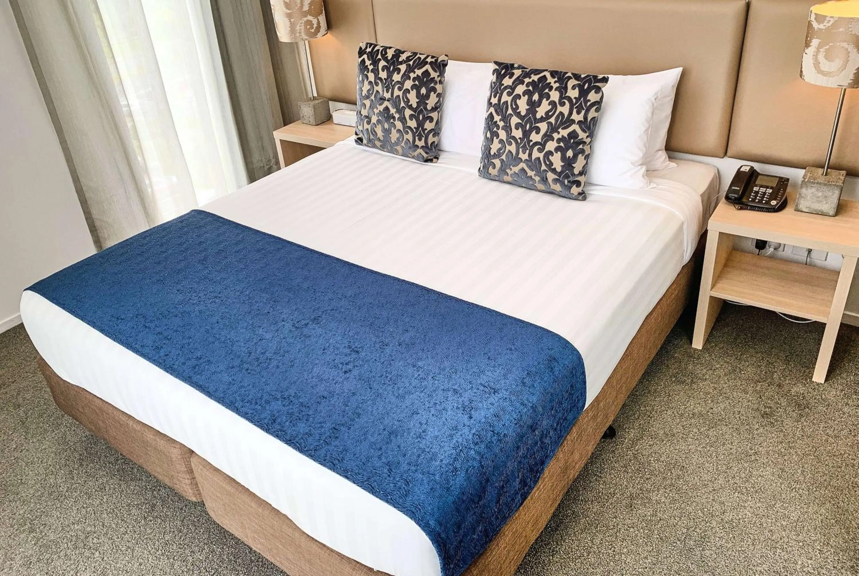 Photo of the whole room, Bed in Ramada Suites by Wyndham Albany