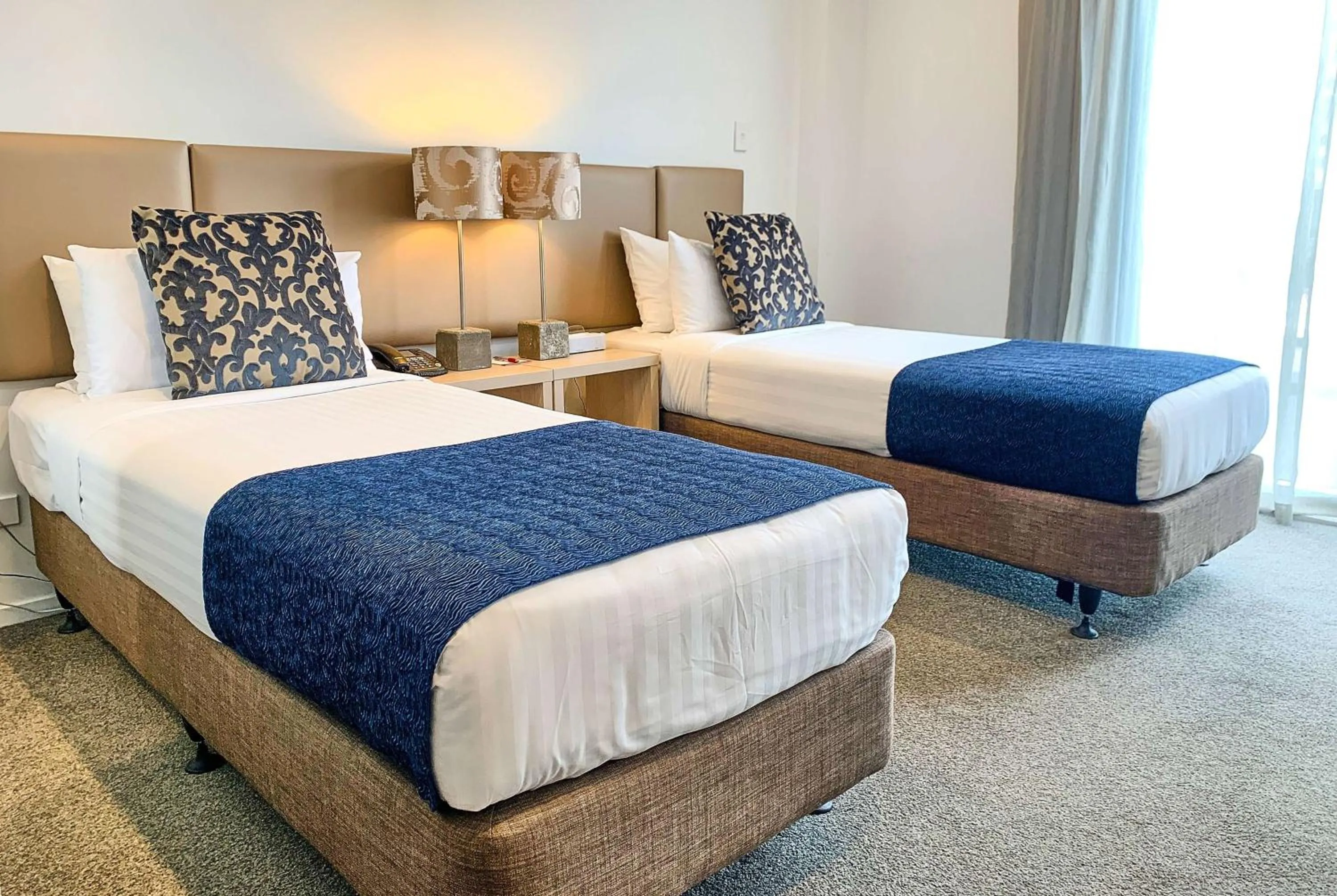 Photo of the whole room, Bed in Ramada Suites by Wyndham Albany