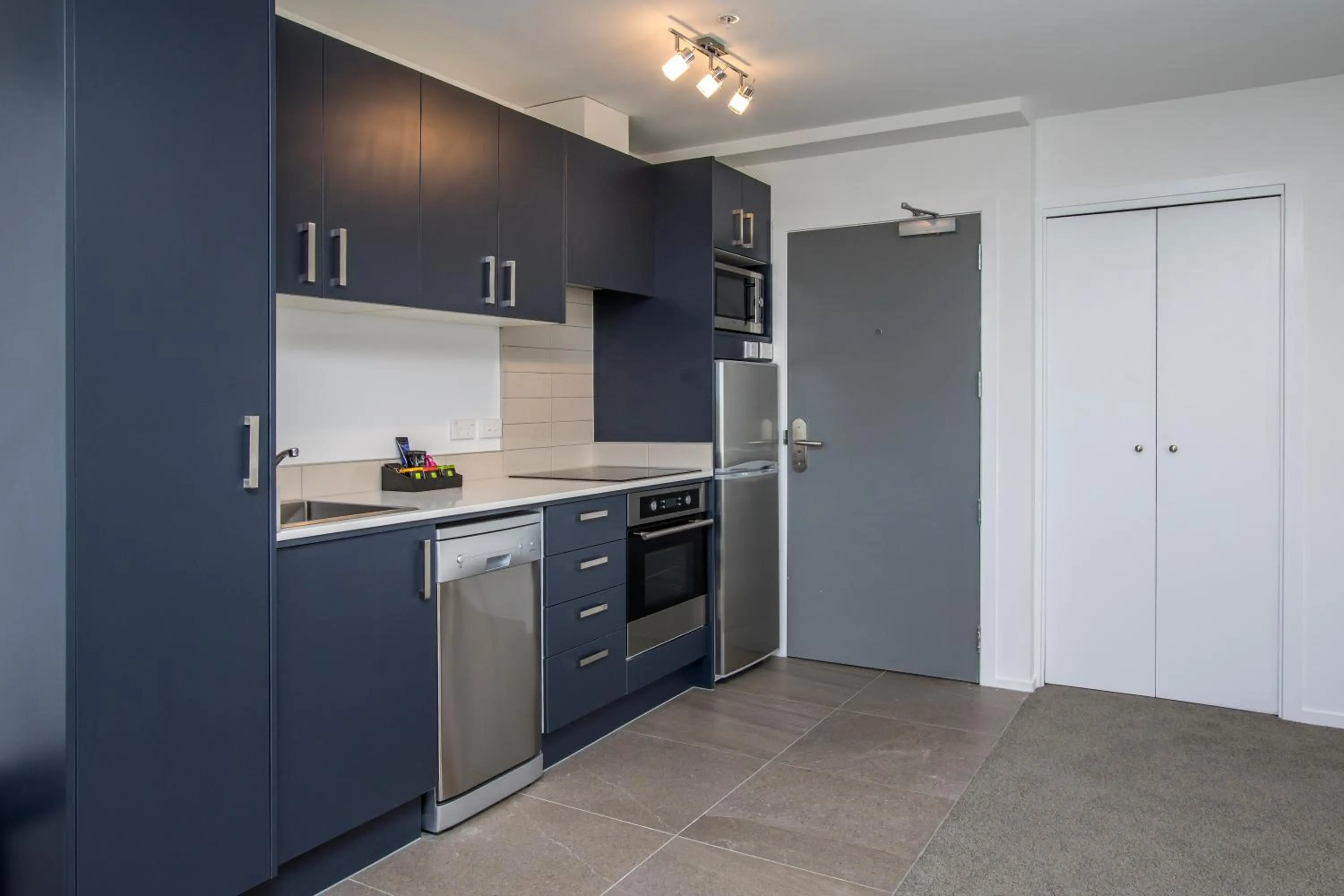 Kitchen or kitchenette in Ramada Suites by Wyndham Albany