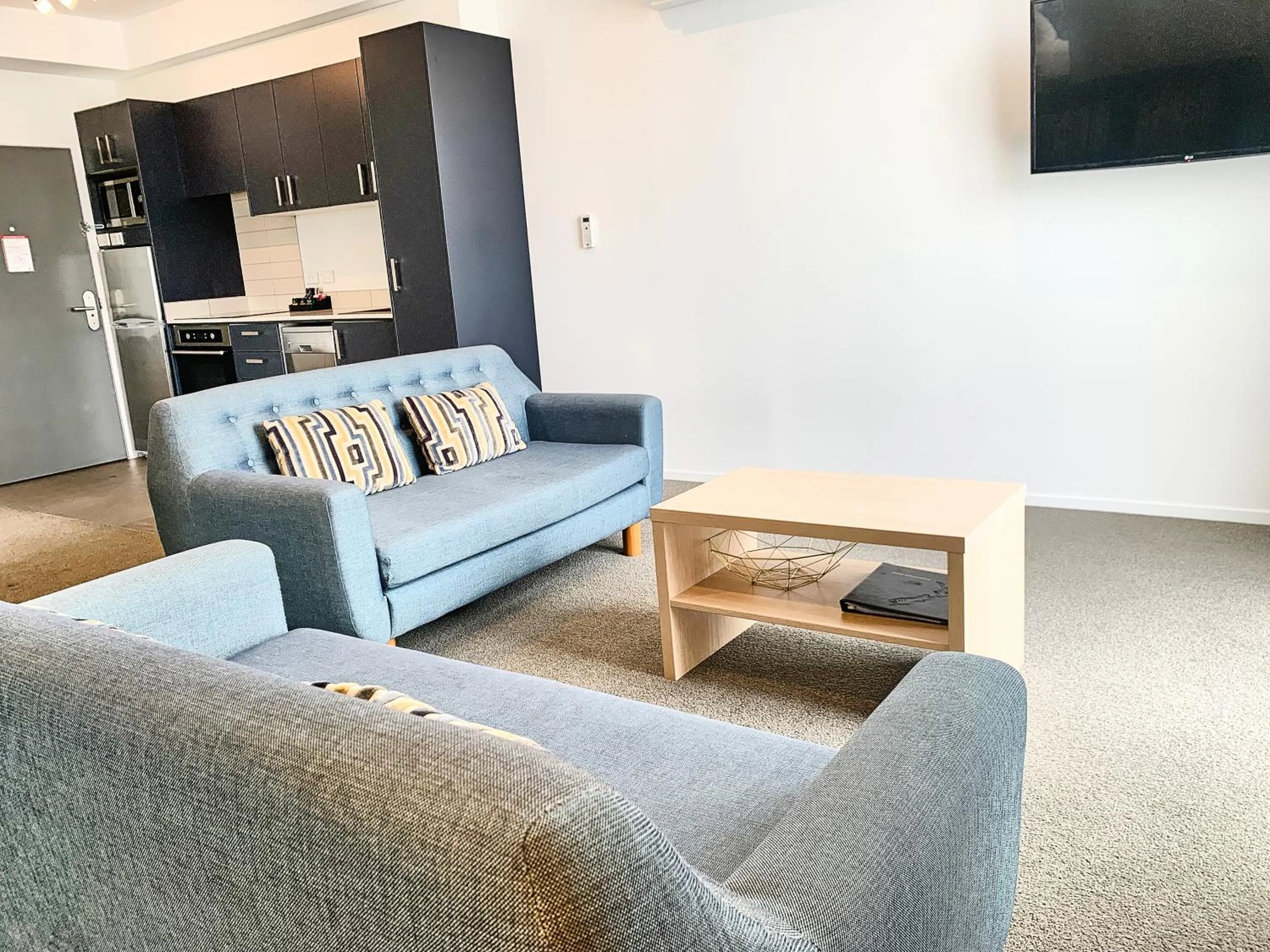 Living room in Ramada Suites by Wyndham Albany