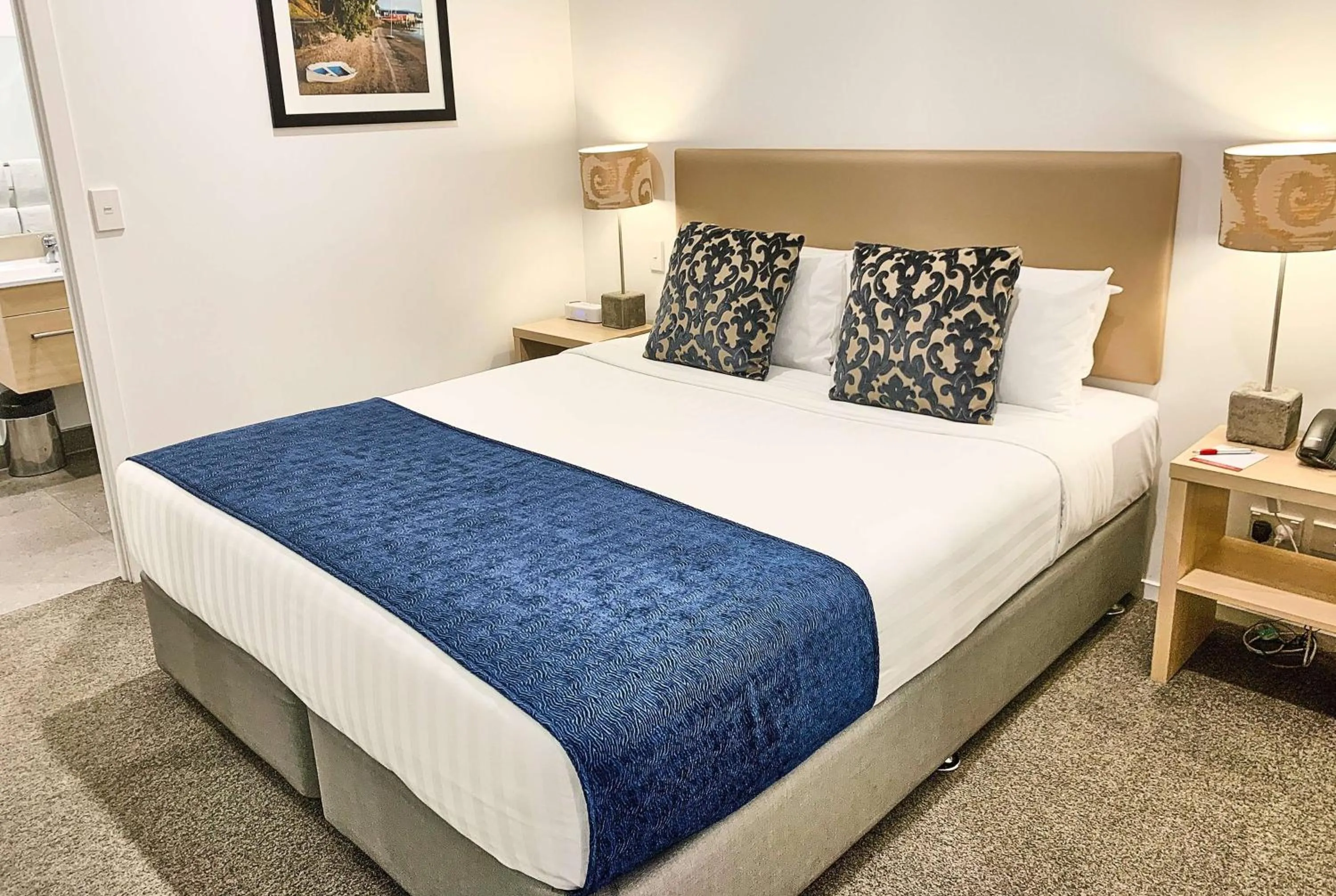 Photo of the whole room, Bed in Ramada Suites by Wyndham Albany