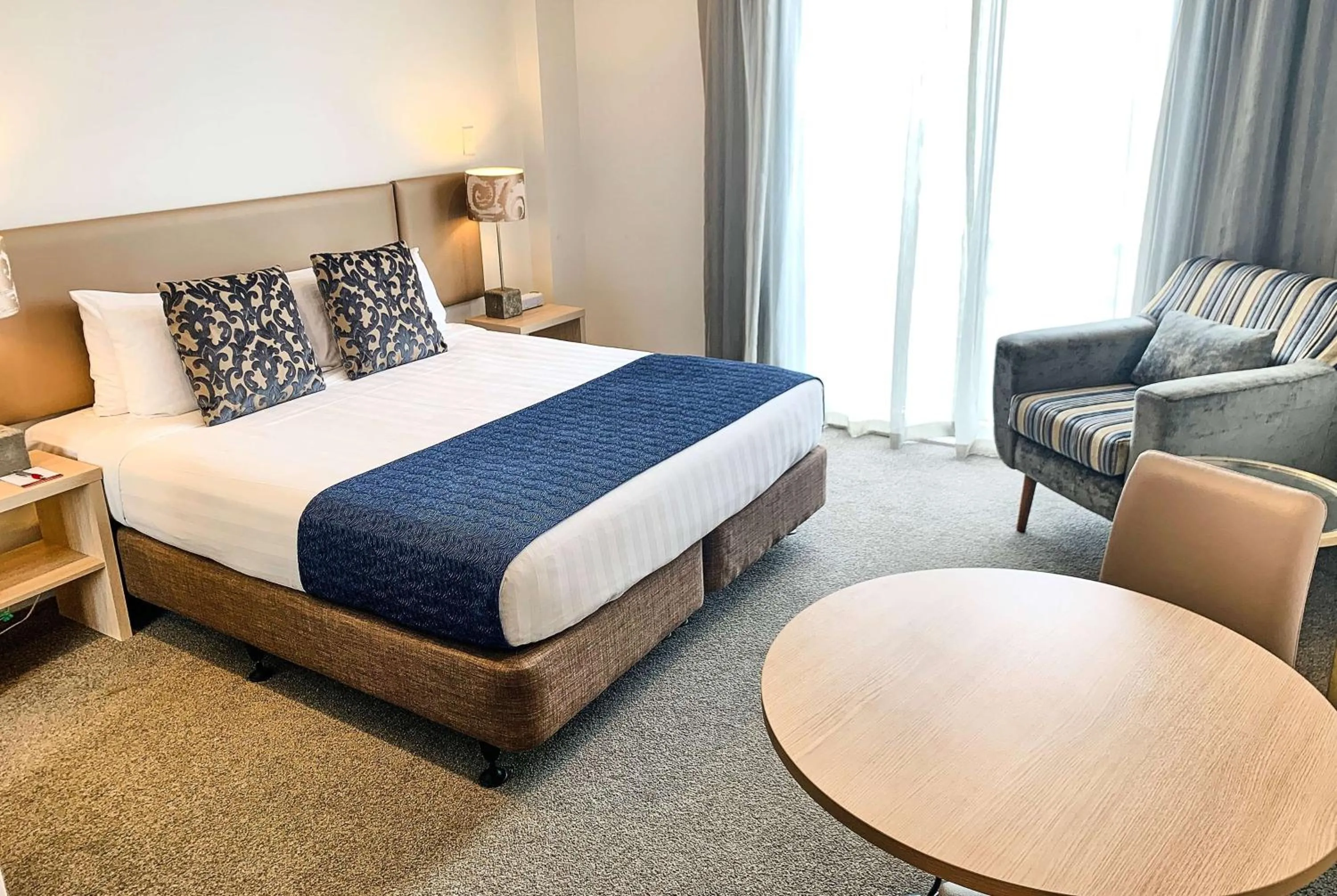 Photo of the whole room, Bed in Ramada Suites by Wyndham Albany