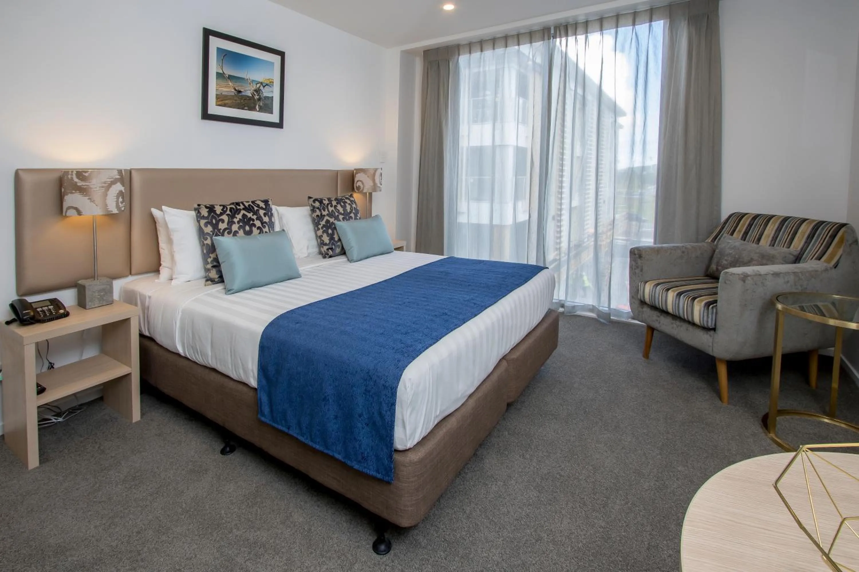 Bedroom, Bed in Ramada Suites by Wyndham Albany