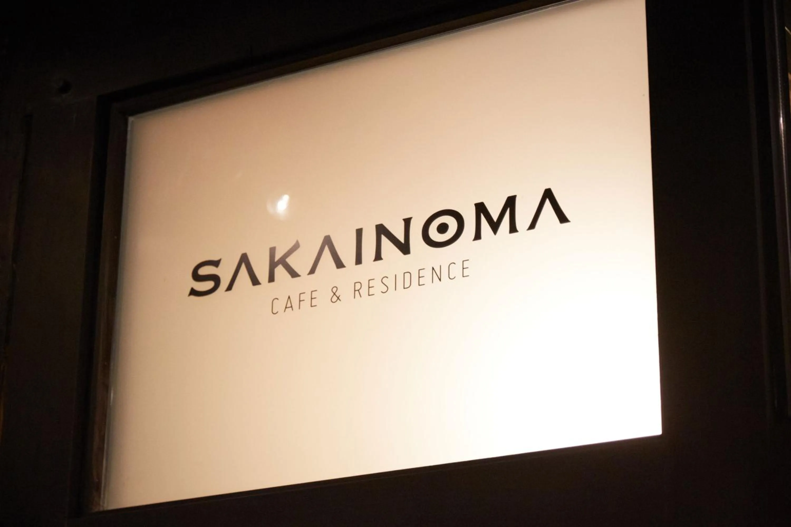 Property logo or sign in sakainoma hotel 熊
