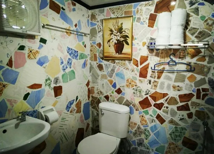Toilet in Alona's Traditional Filipino Home near 100 Islands Wharf