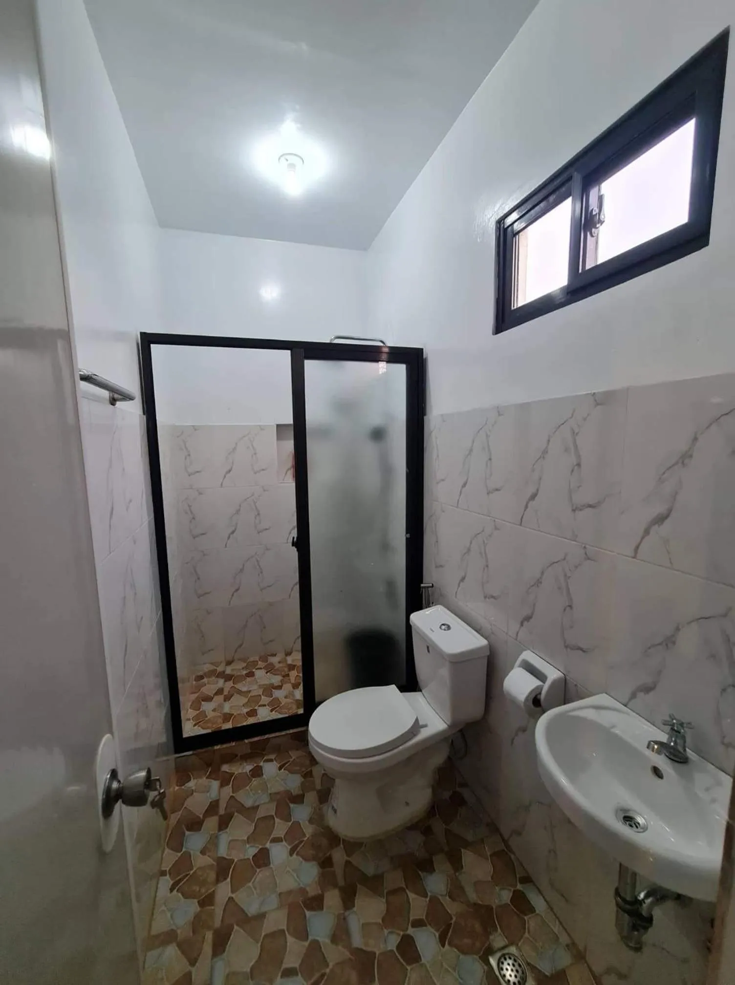 Shower in Alona's Traditional Filipino Home near 100 Islands Wharf