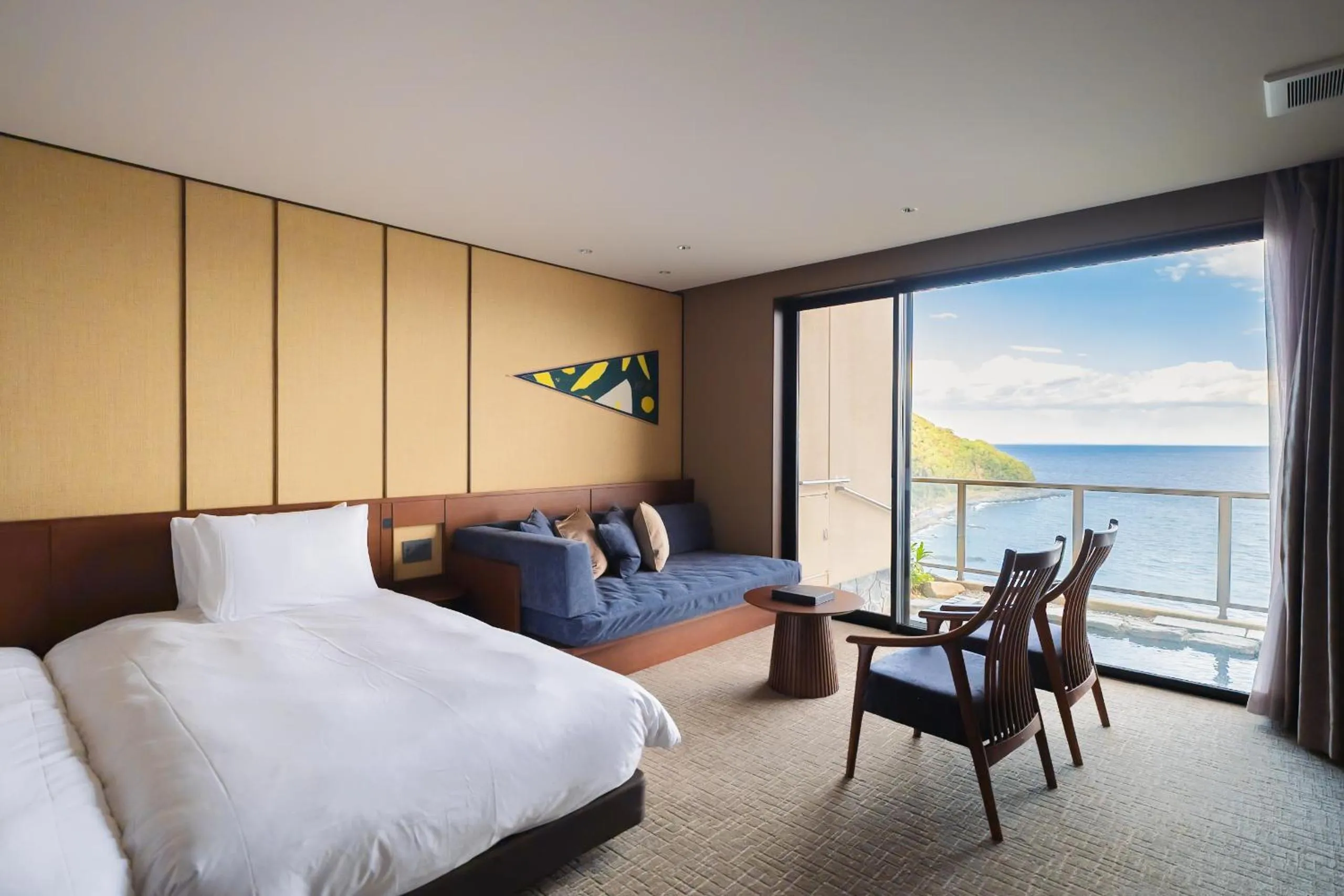 Bed in IZU RETREAT by Onko Chishin