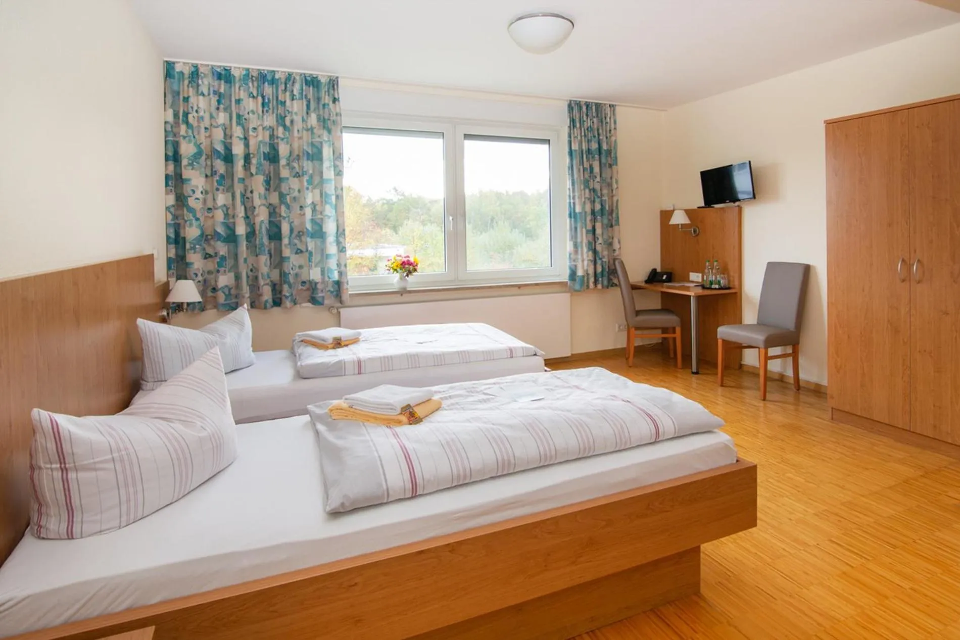 Photo of the whole room, Bed in Das Gästehaus Puschendorf