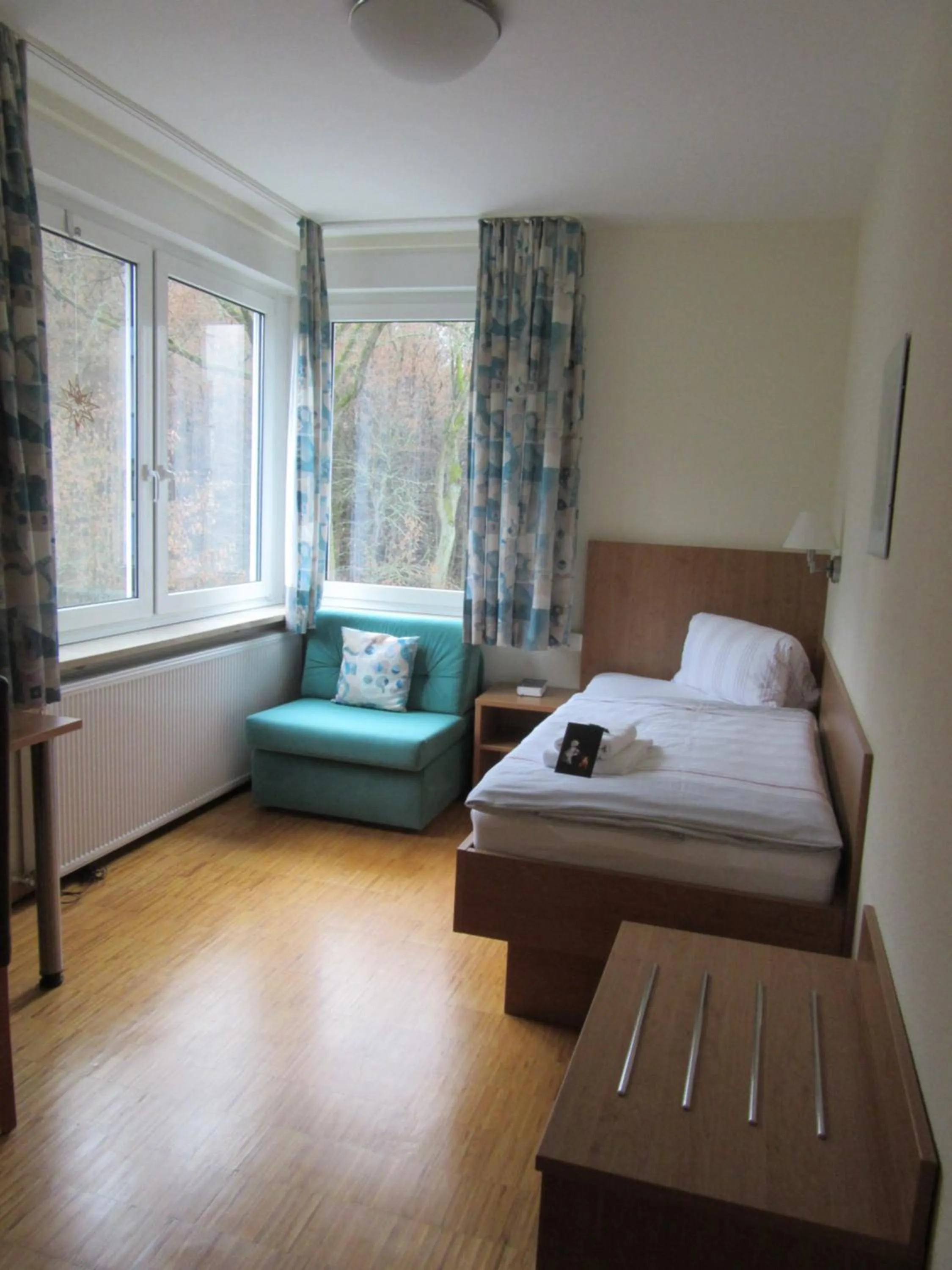 Photo of the whole room, Bed in Das Gästehaus Puschendorf