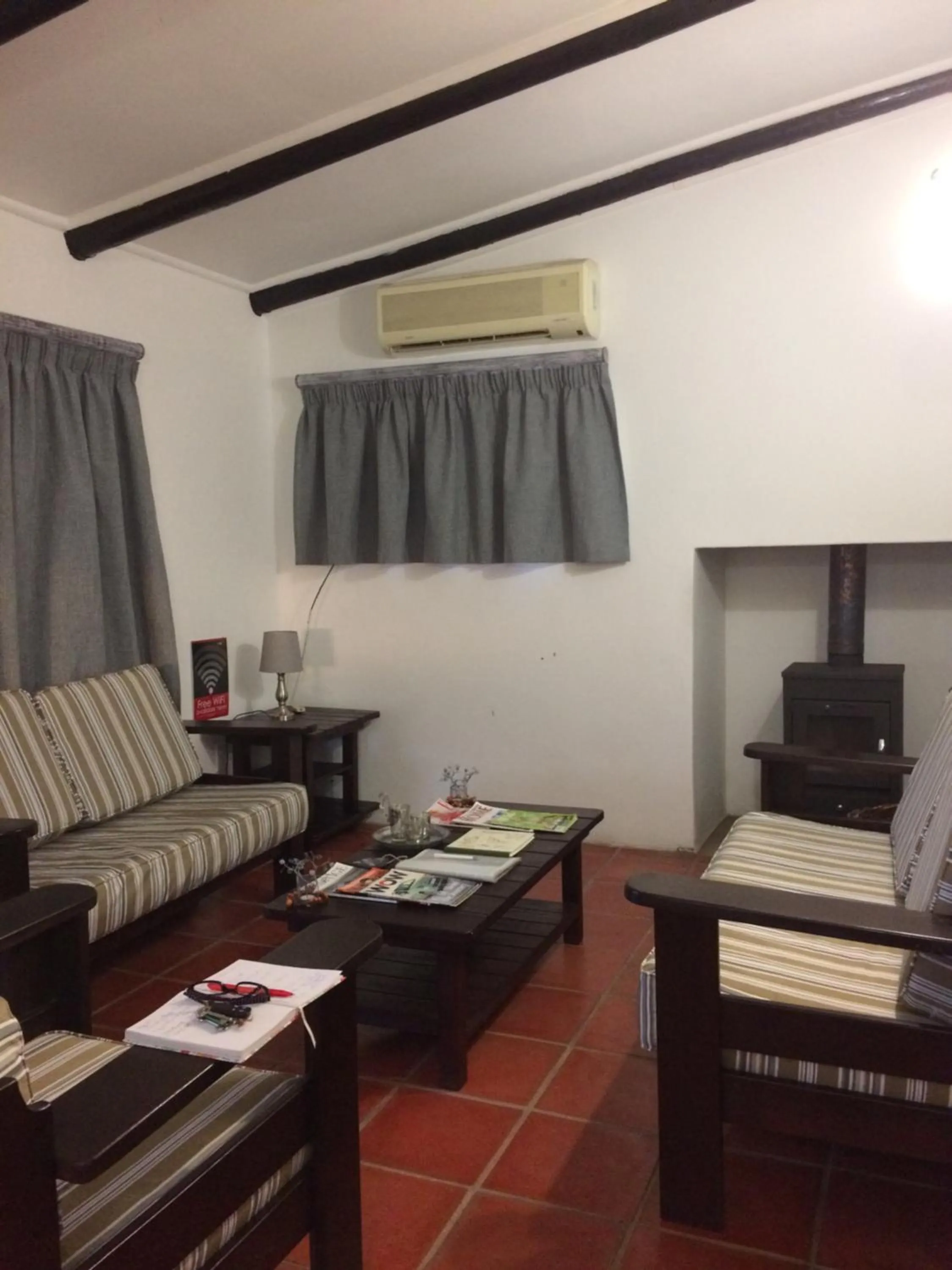 Communal lounge/ TV room in Fraaigelegen Farm - Home of ADHARA EVOO