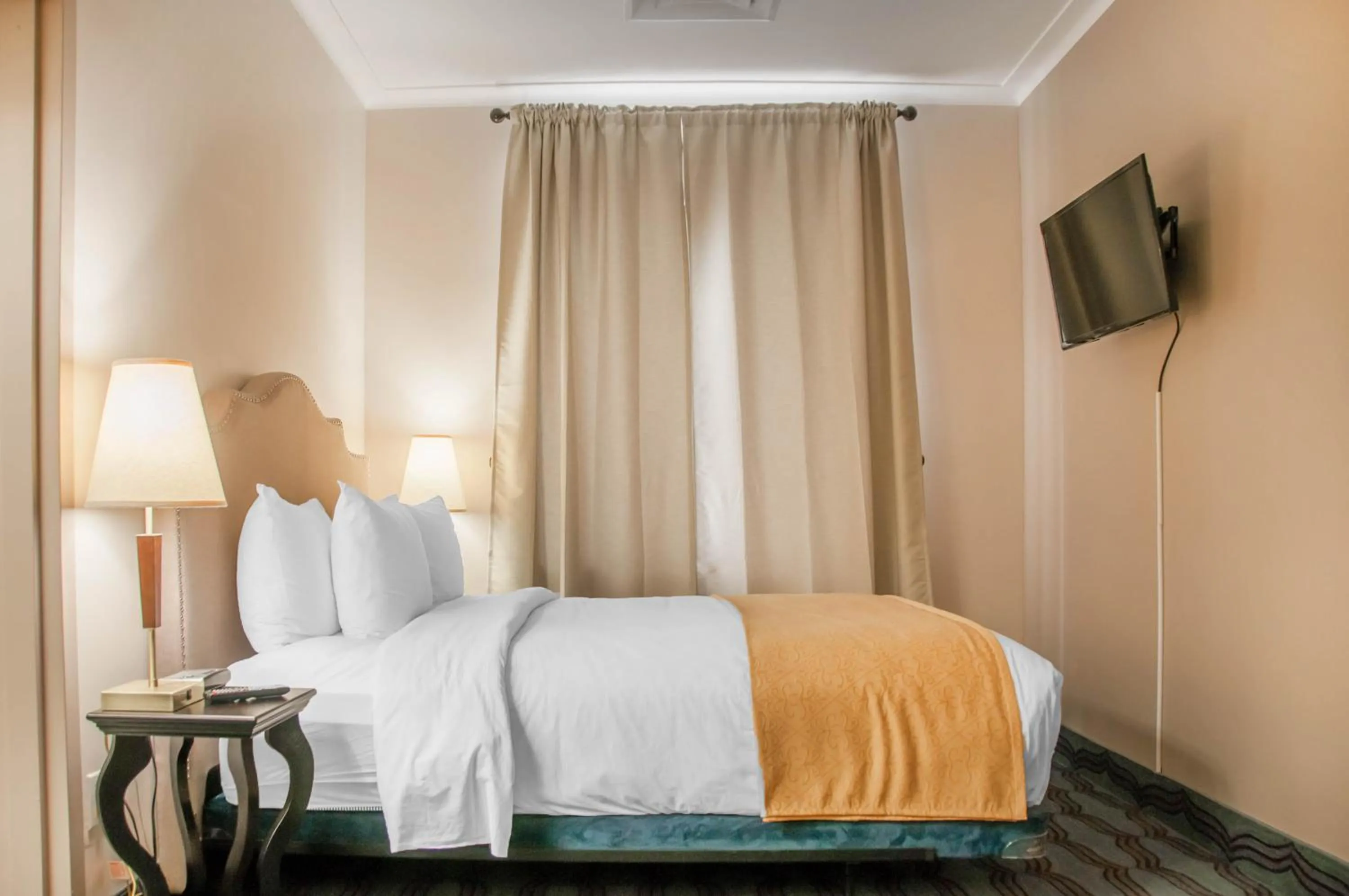 Bed in Empire Suites