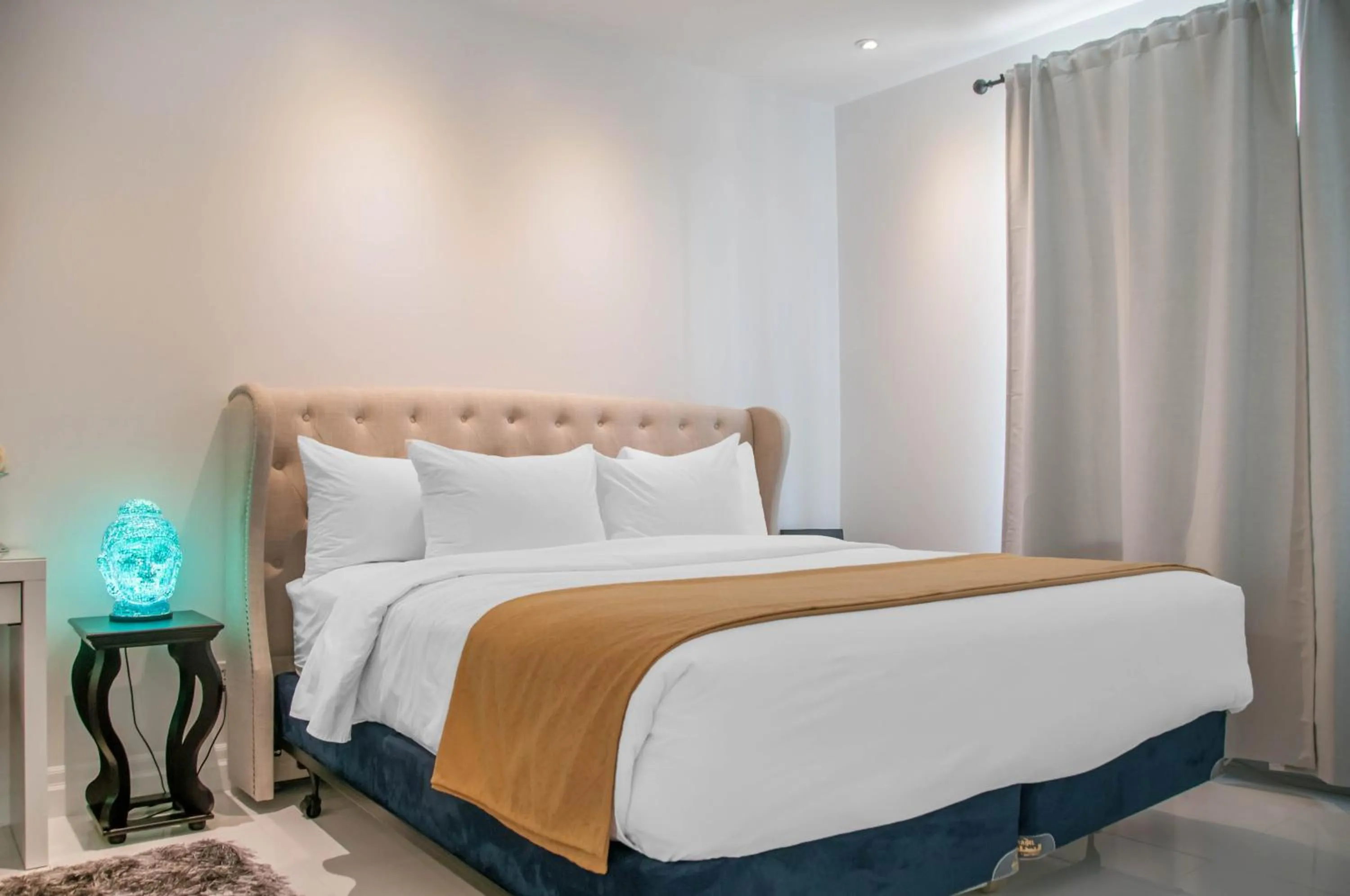 Bed in Empire Suites