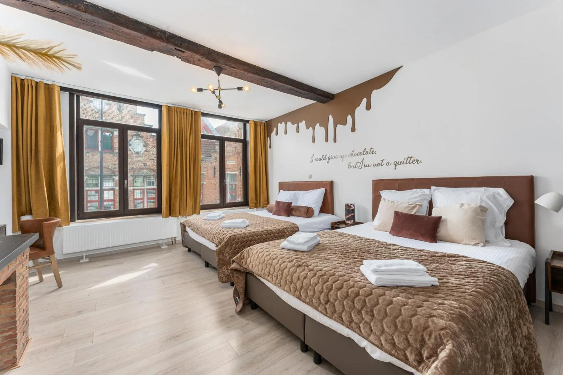 Photo of the whole room, Bed in The Chocolate Suites