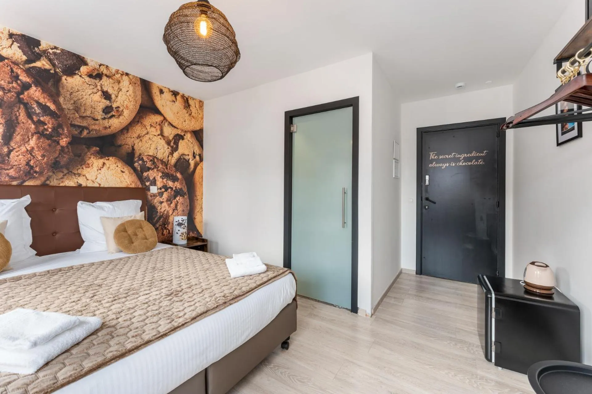 Photo of the whole room, Bed in The Chocolate Suites