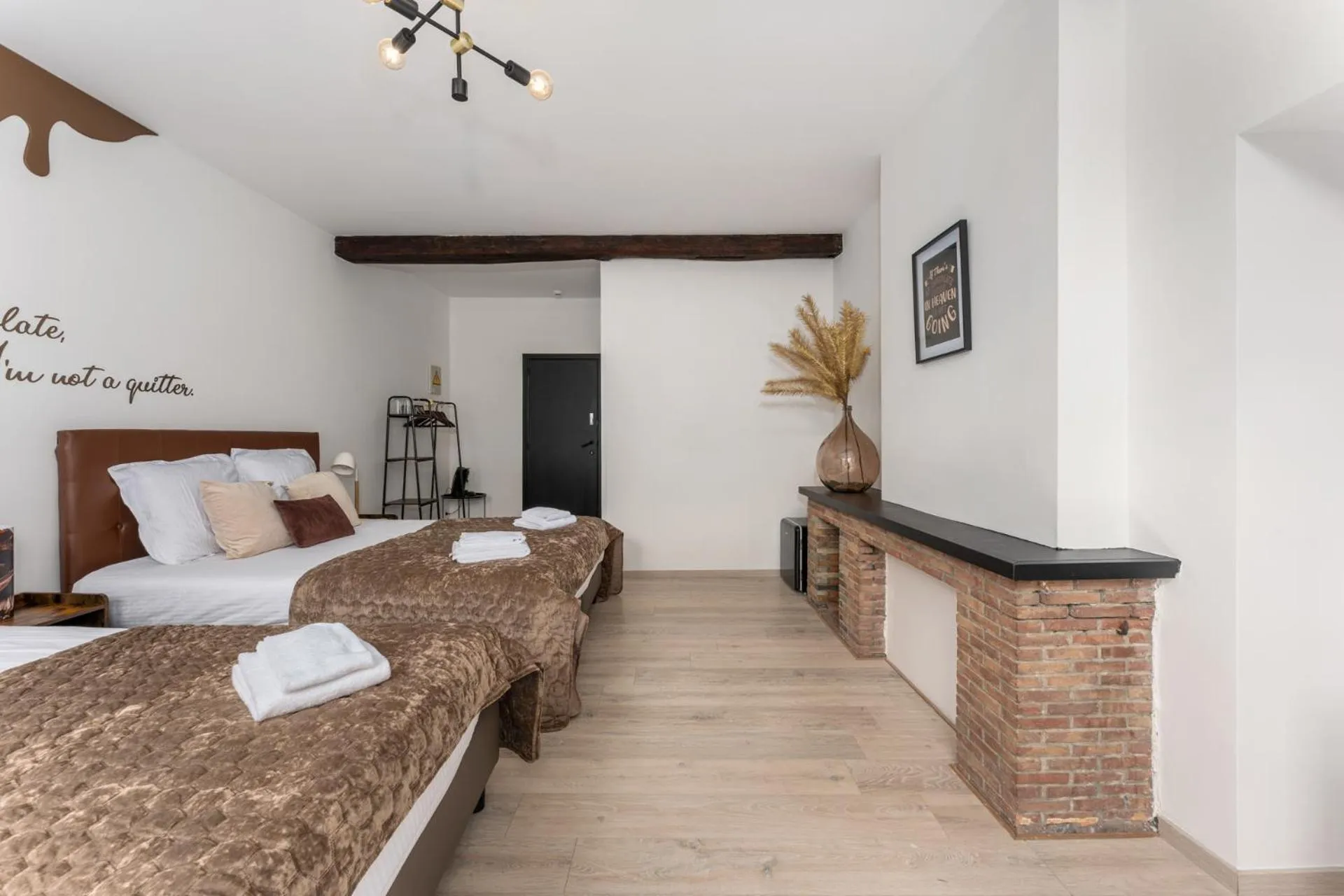 Photo of the whole room, Bed in The Chocolate Suites