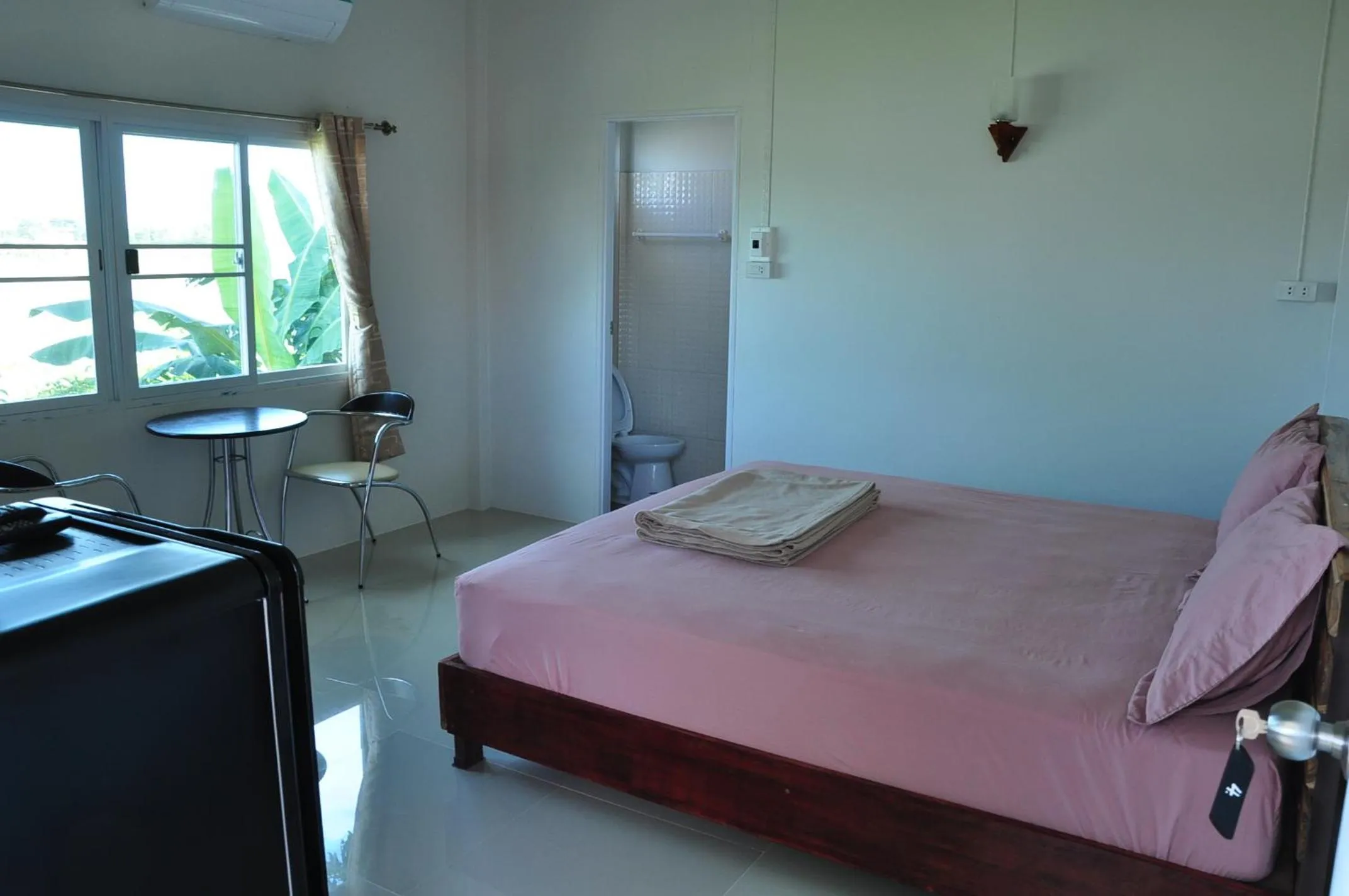 Bedroom, Bed in The Rim Riverside Guest House