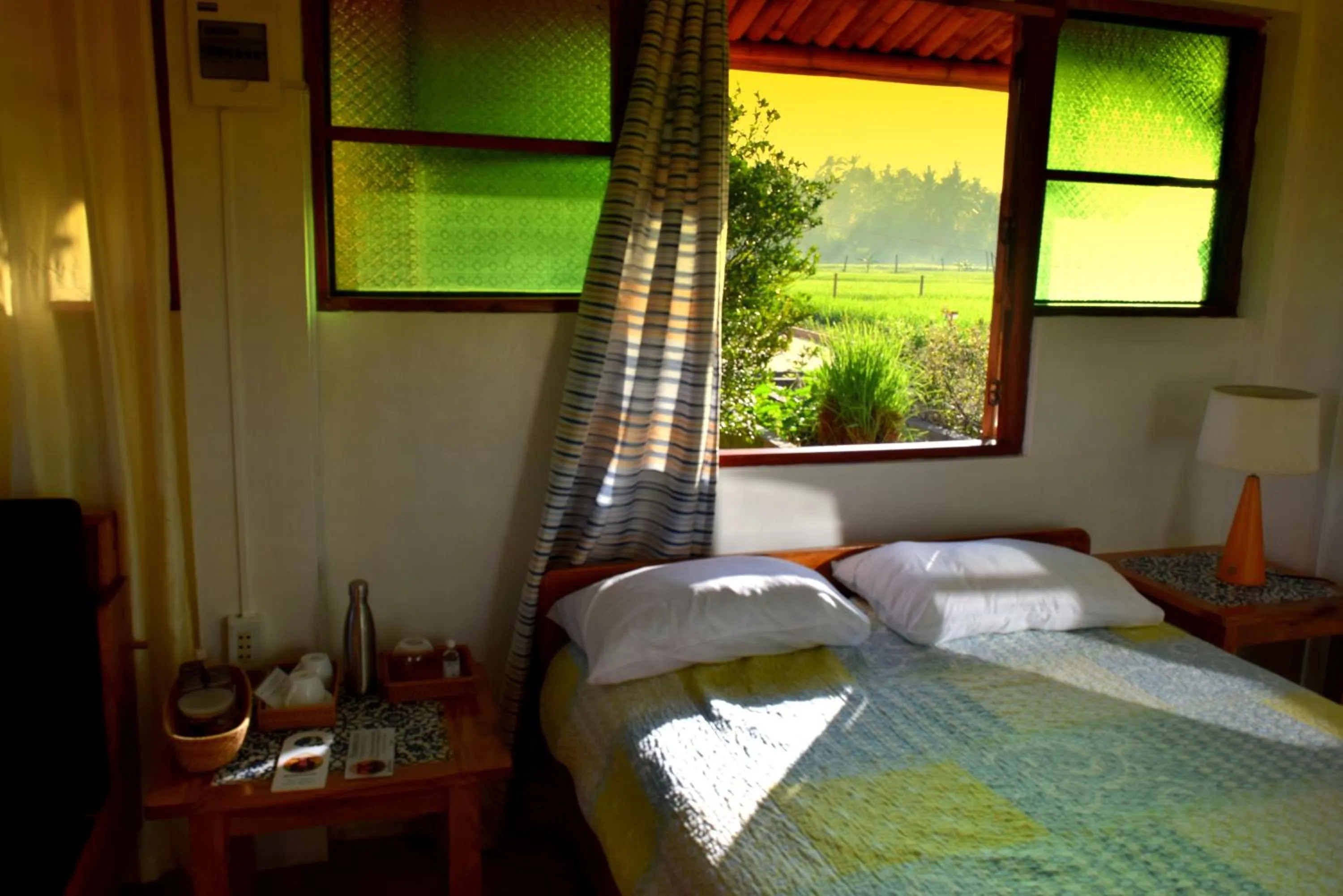 Sunrise, Bed in Guerrera Rice Paddy Villas