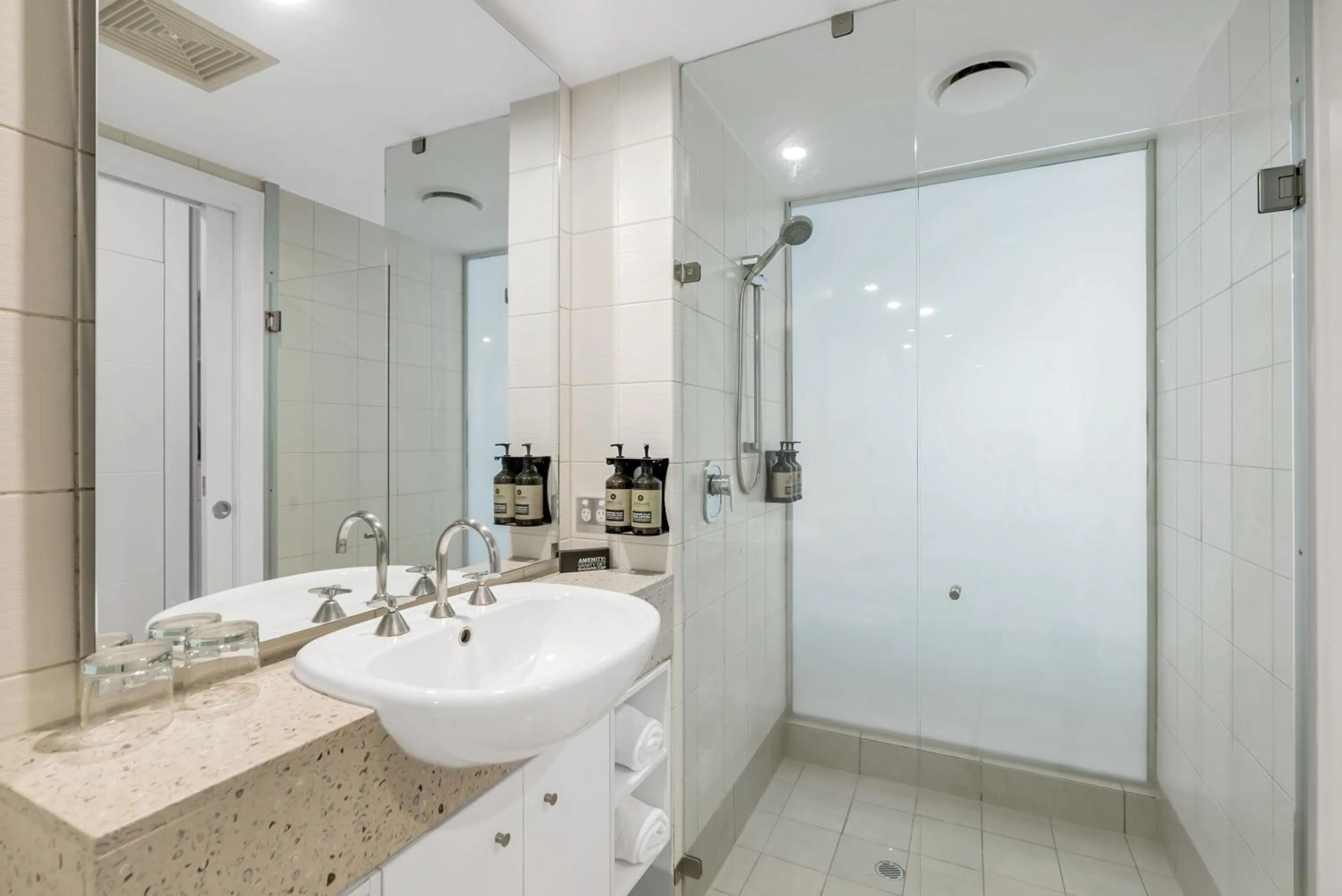 Shower in Elysium Private Apartments at Beach Club & Spa