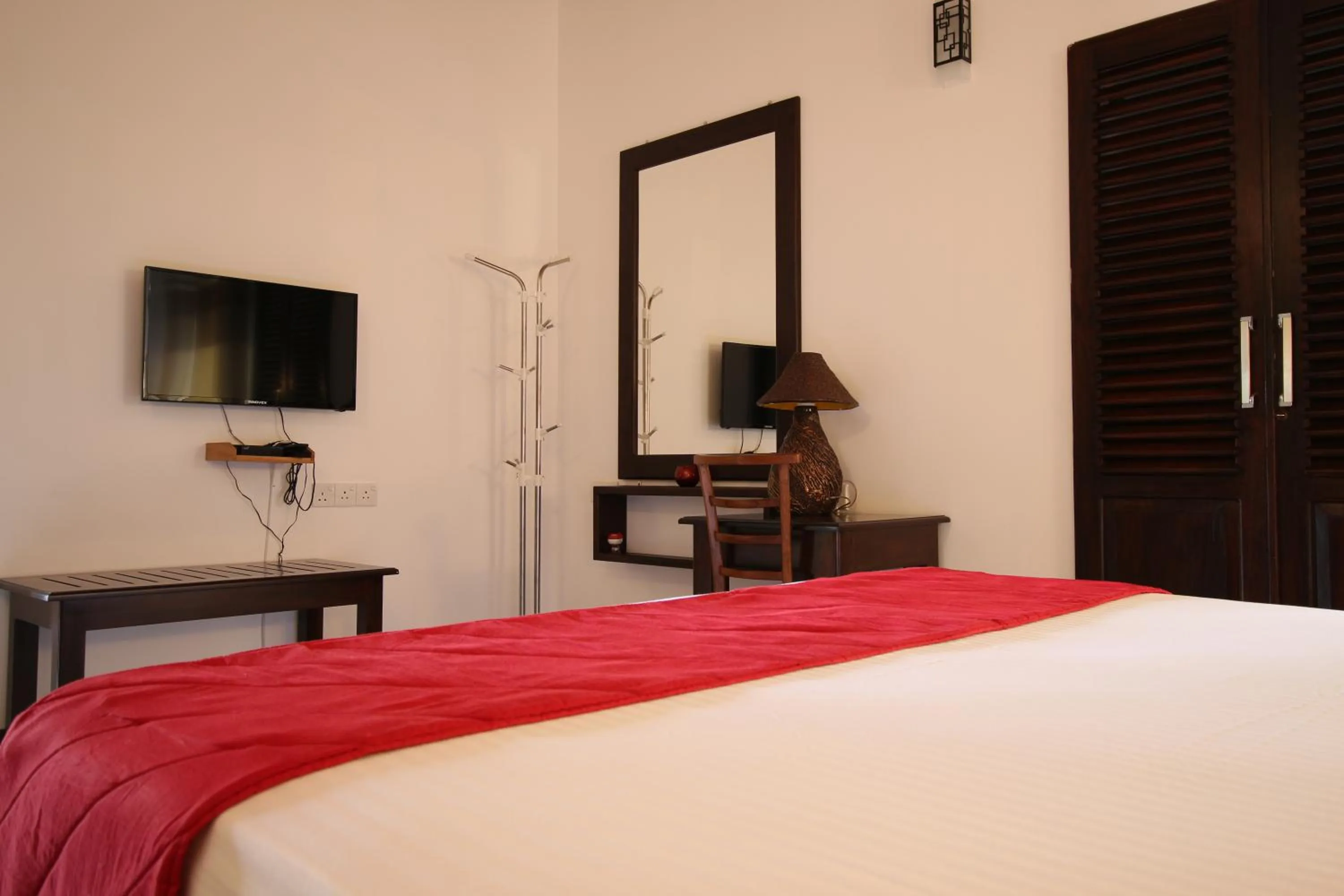 Bed in River Breeze Villa Bentota