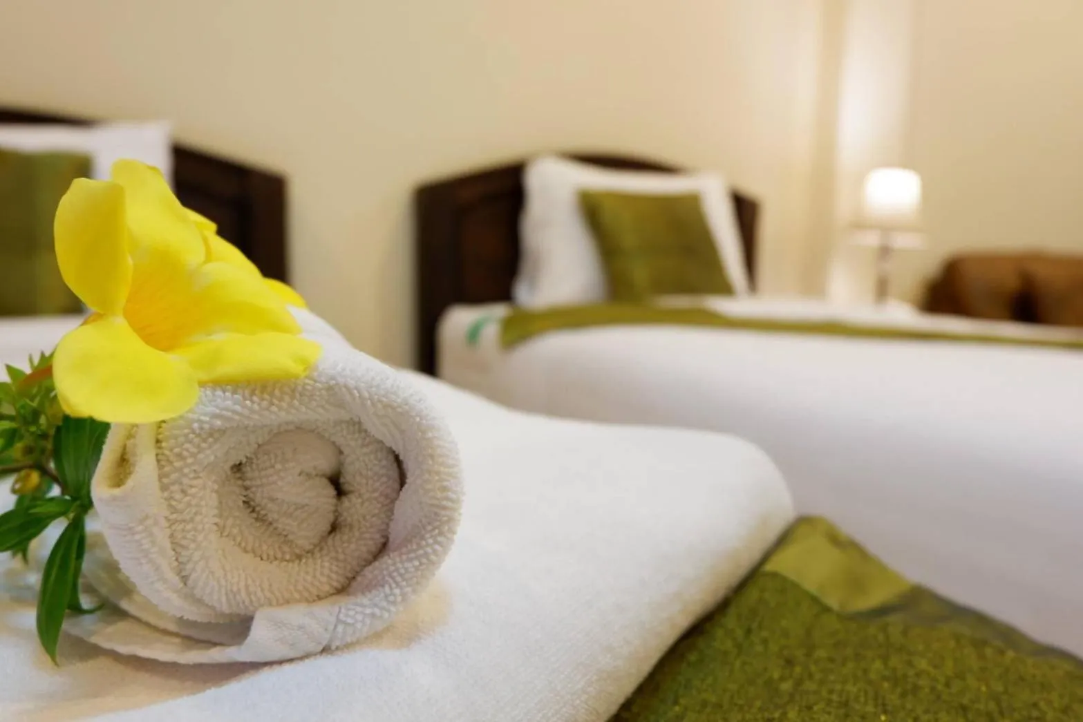 Bed in NanBaanKhun Hotel