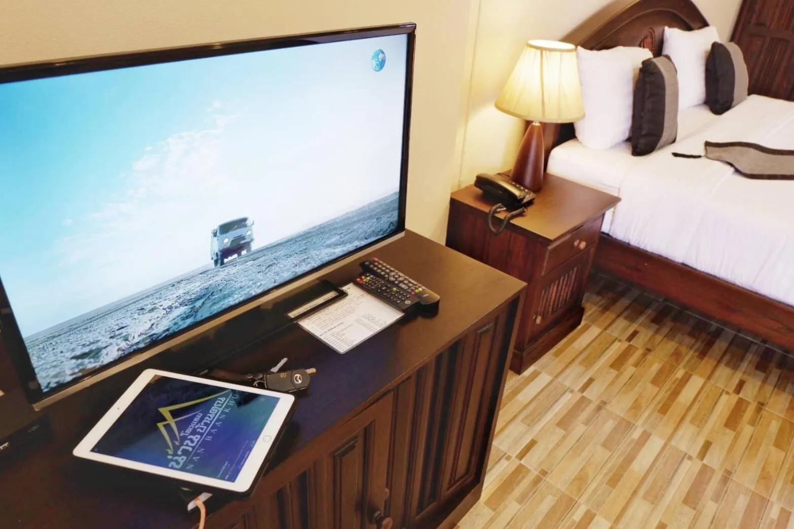 Bed in NanBaanKhun Hotel