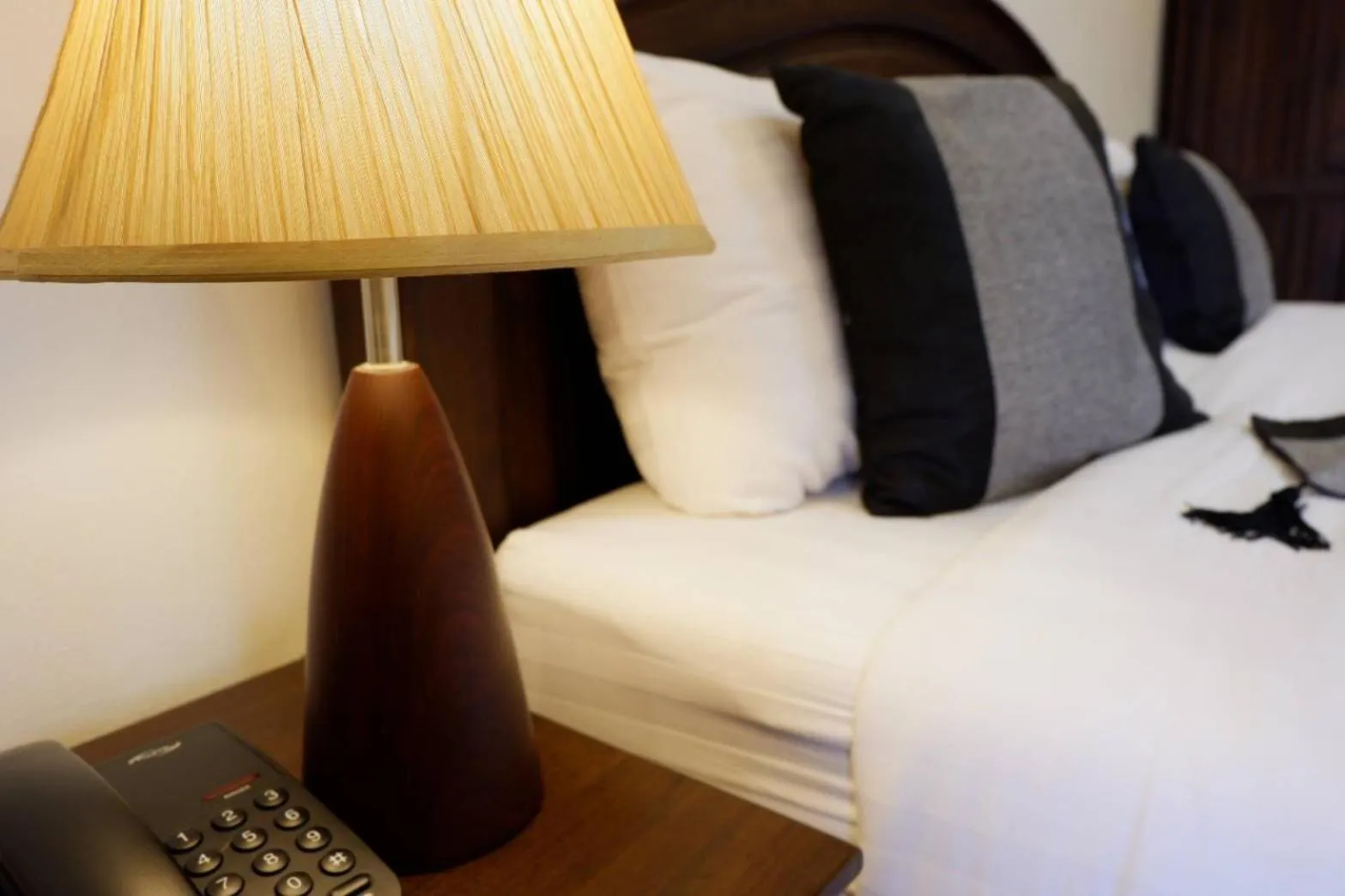 Bed in NanBaanKhun Hotel