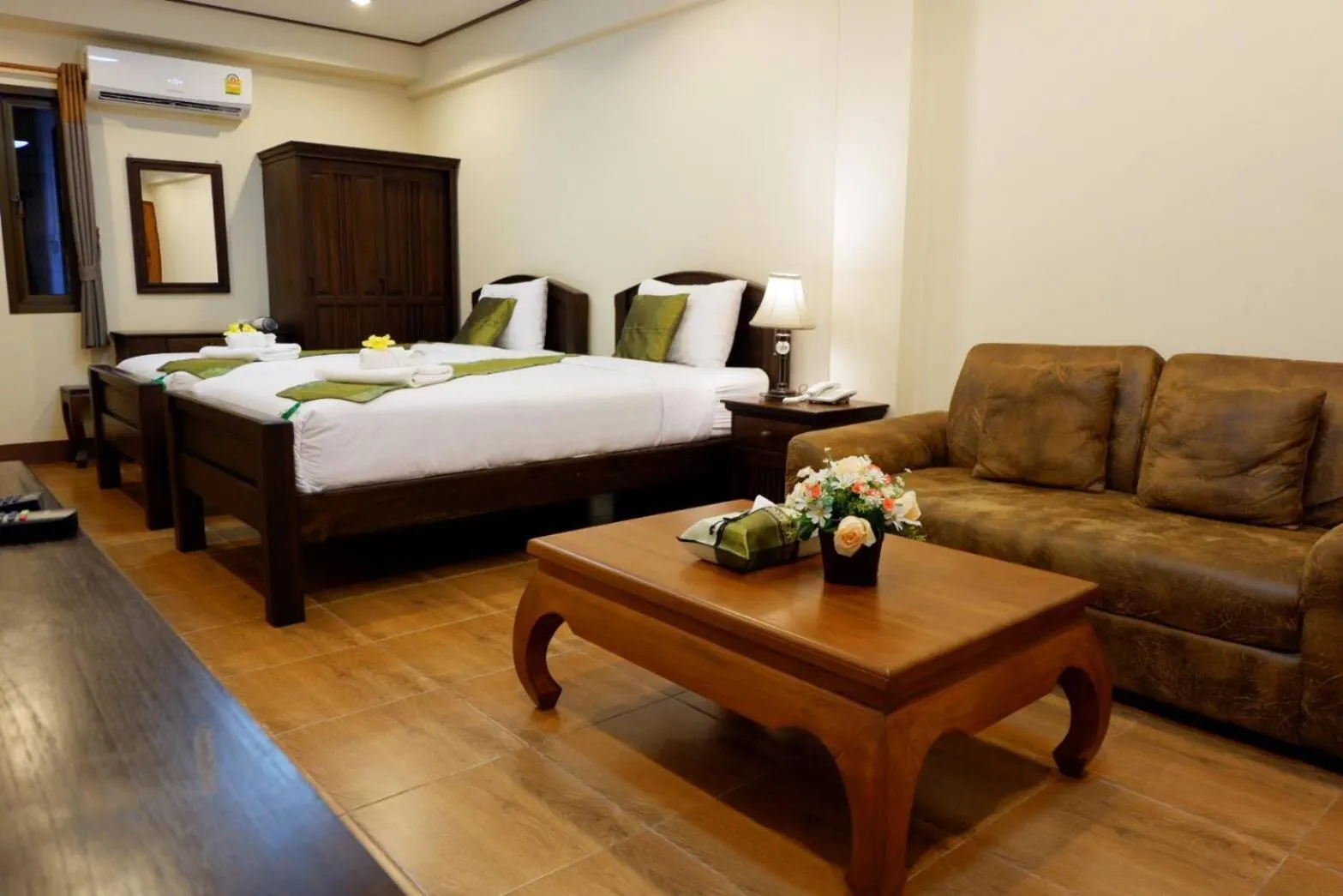 Bed in NanBaanKhun Hotel