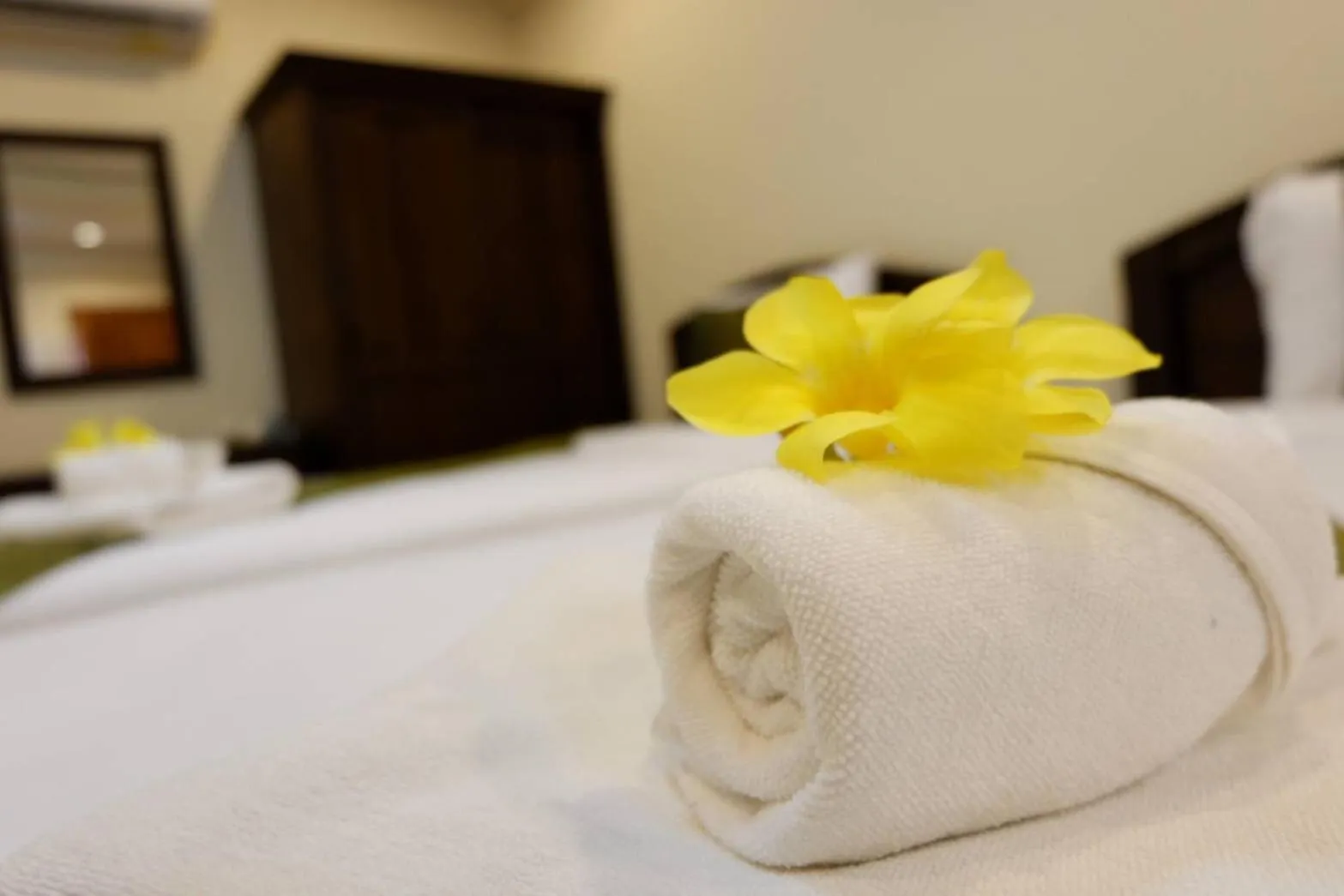 Bed in NanBaanKhun Hotel