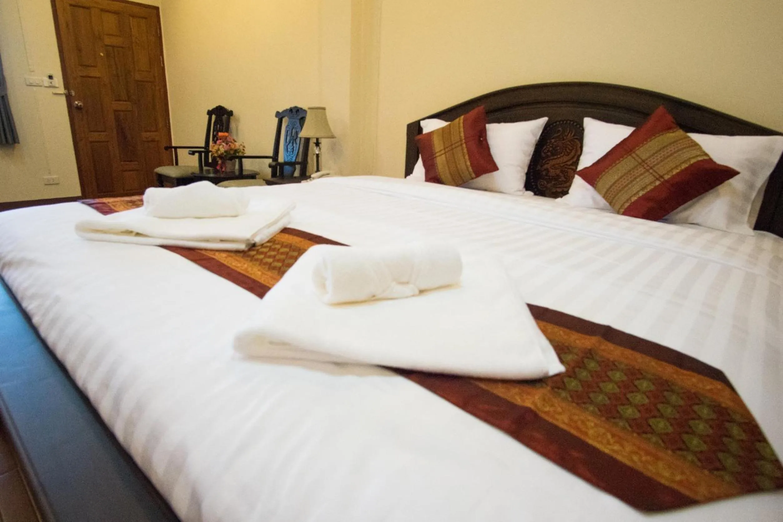 Bedroom, Bed in NanBaanKhun Hotel