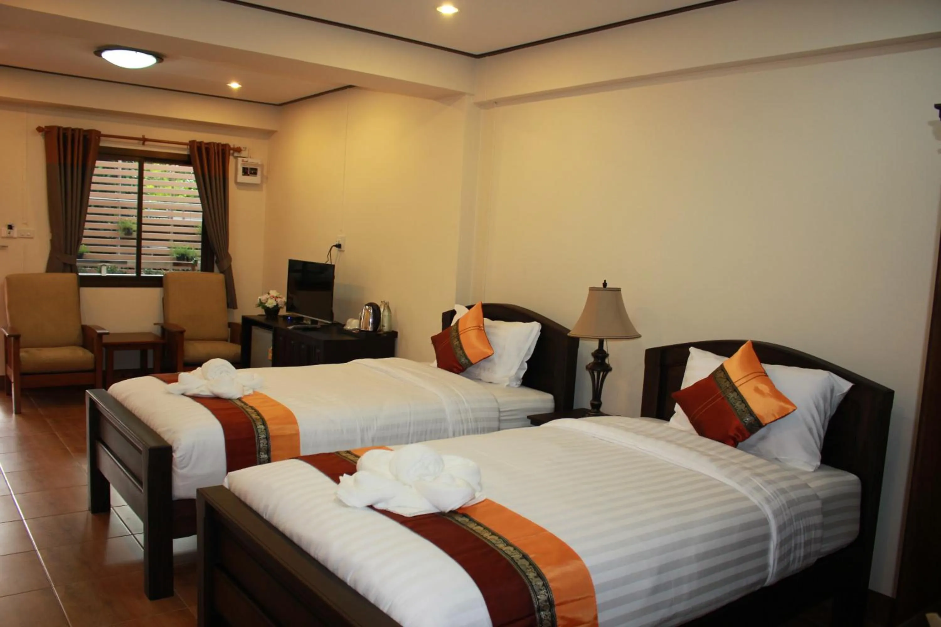 Bedroom, Bed in NanBaanKhun Hotel