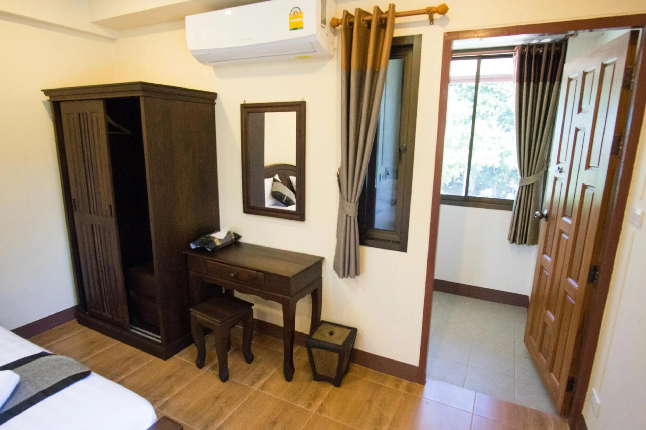 Bedroom, Bed in NanBaanKhun Hotel