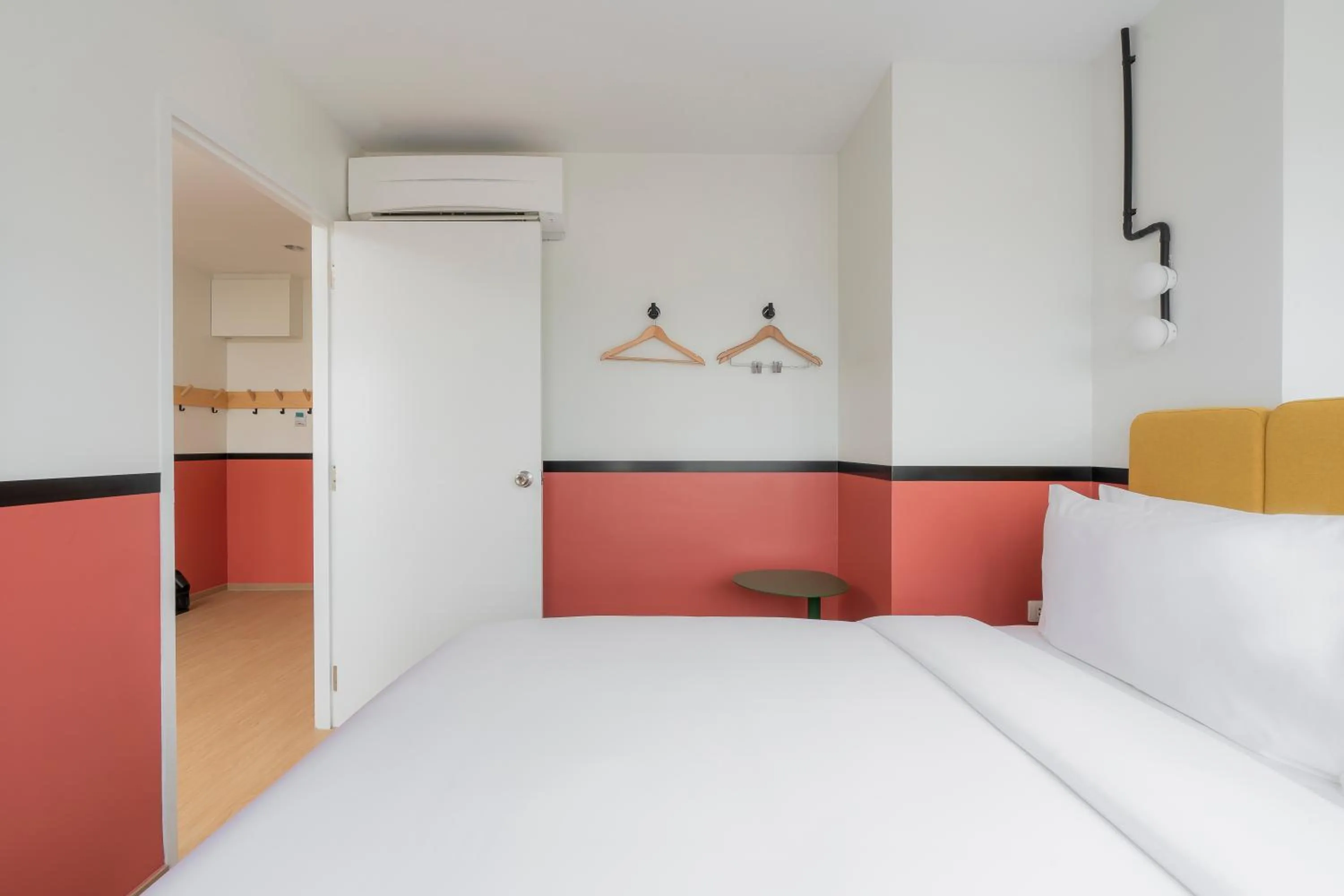 Bed in The Grass Serviced Suites