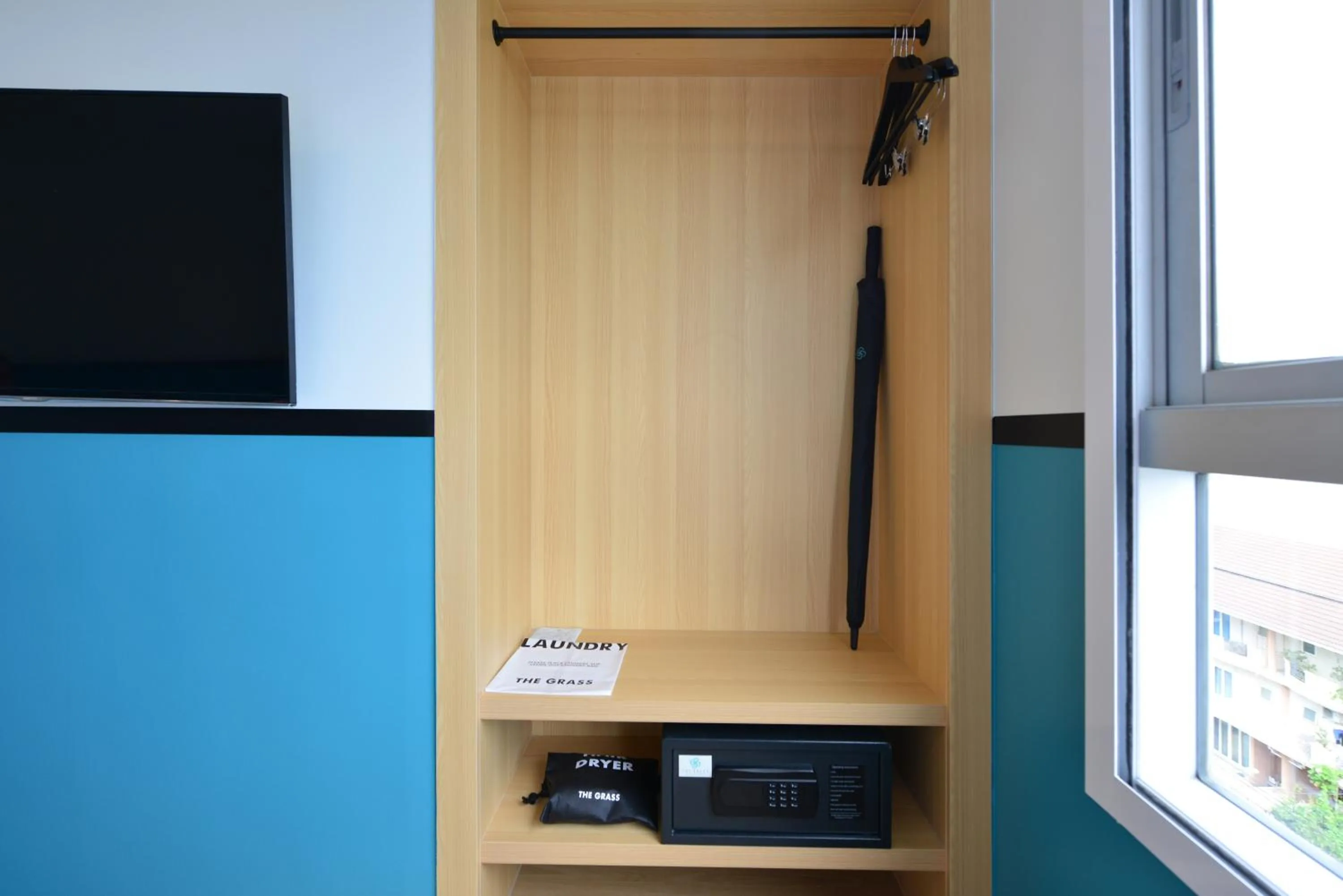 wardrobe in The Grass Serviced Suites