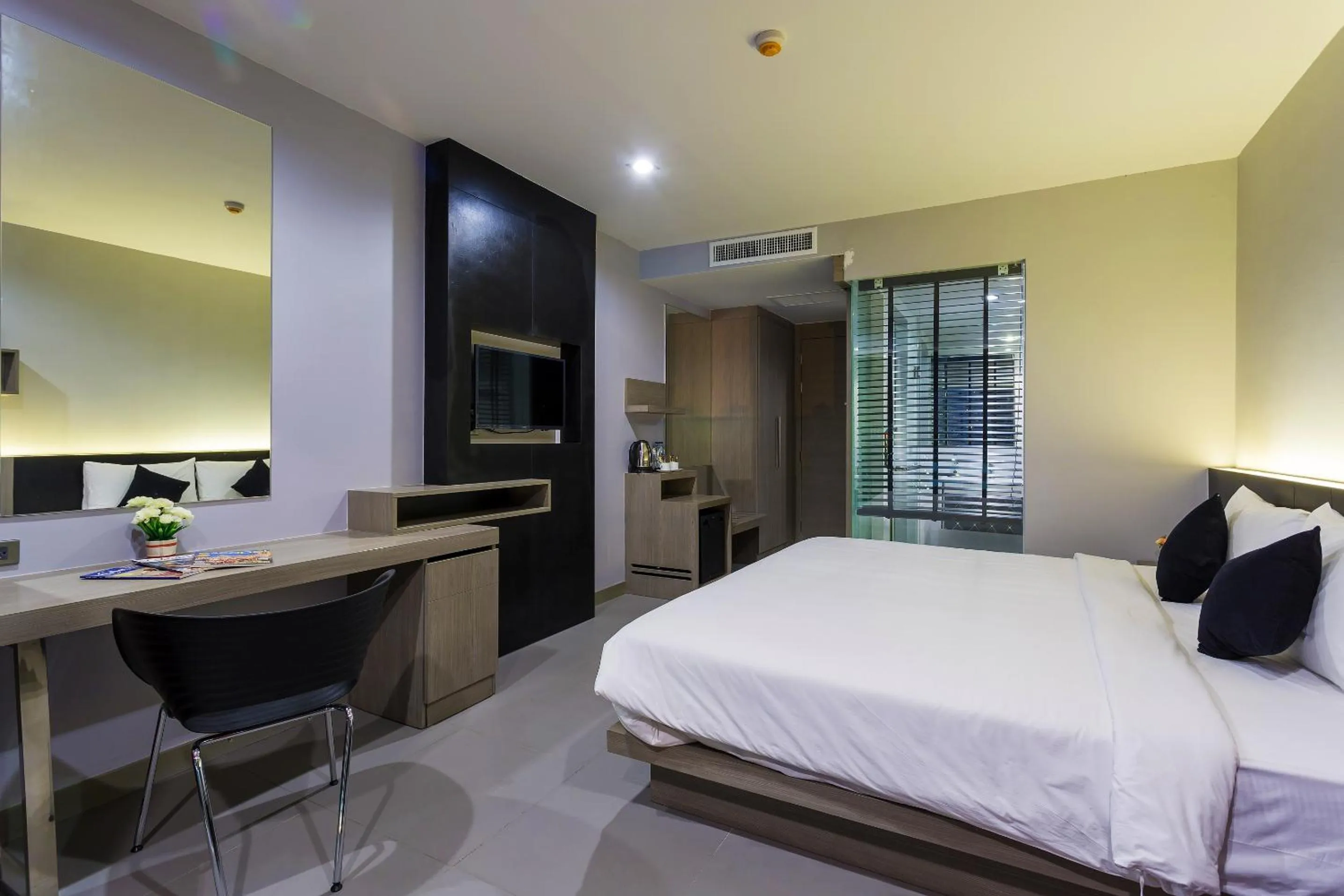 Bed in At Patong Hotel - SHA Certified