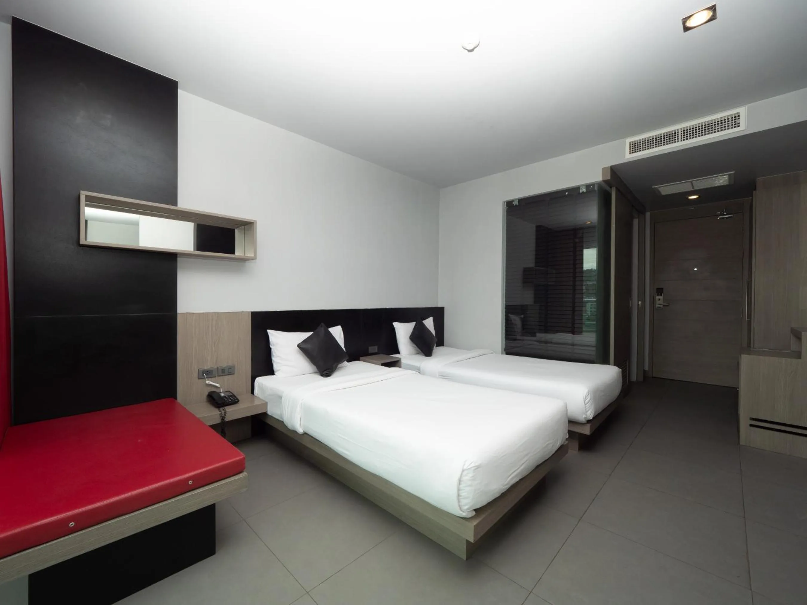 Photo of the whole room, Bed in At Patong Hotel - SHA Certified