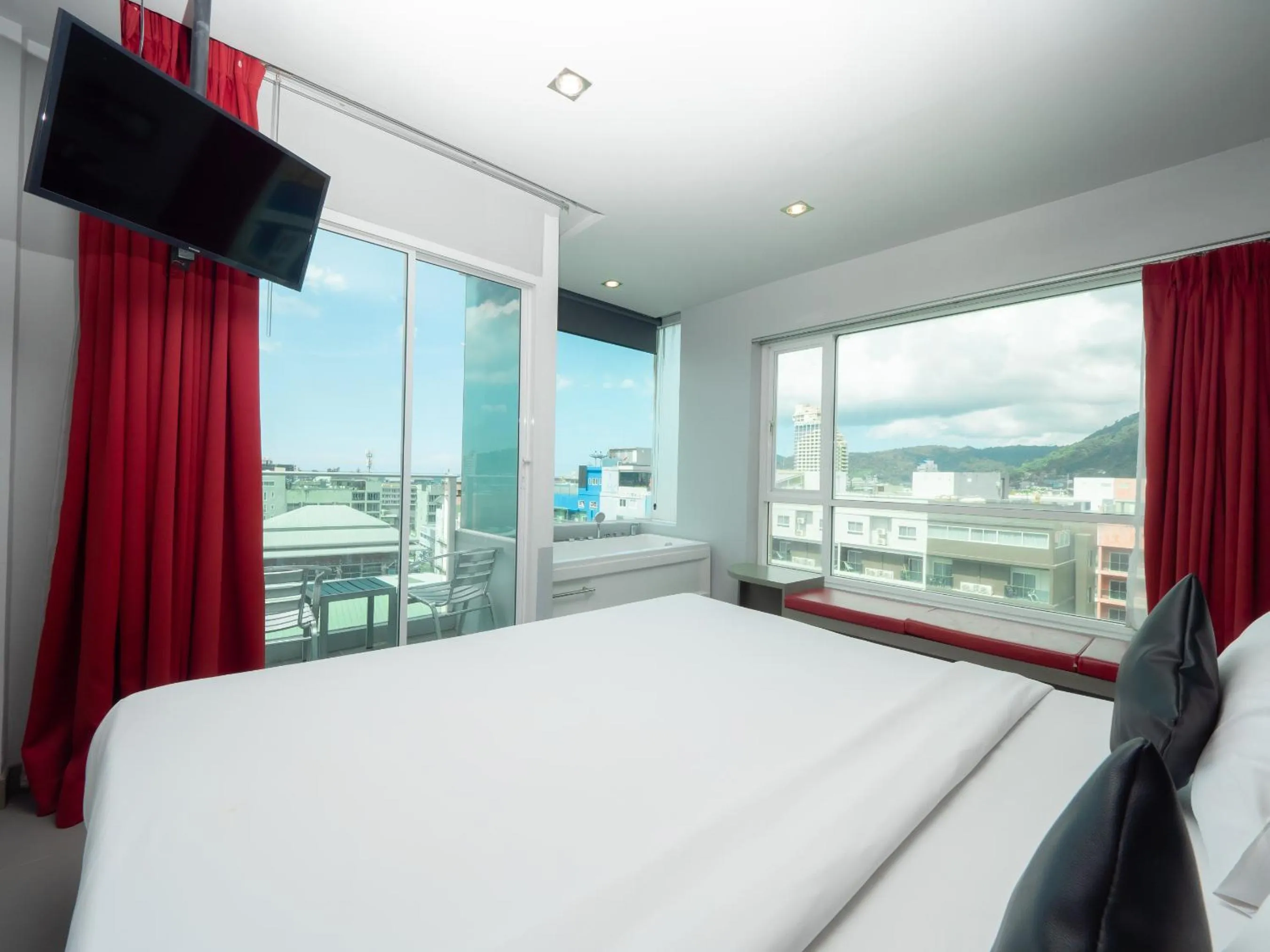 Photo of the whole room, Bed in At Patong Hotel - SHA Certified