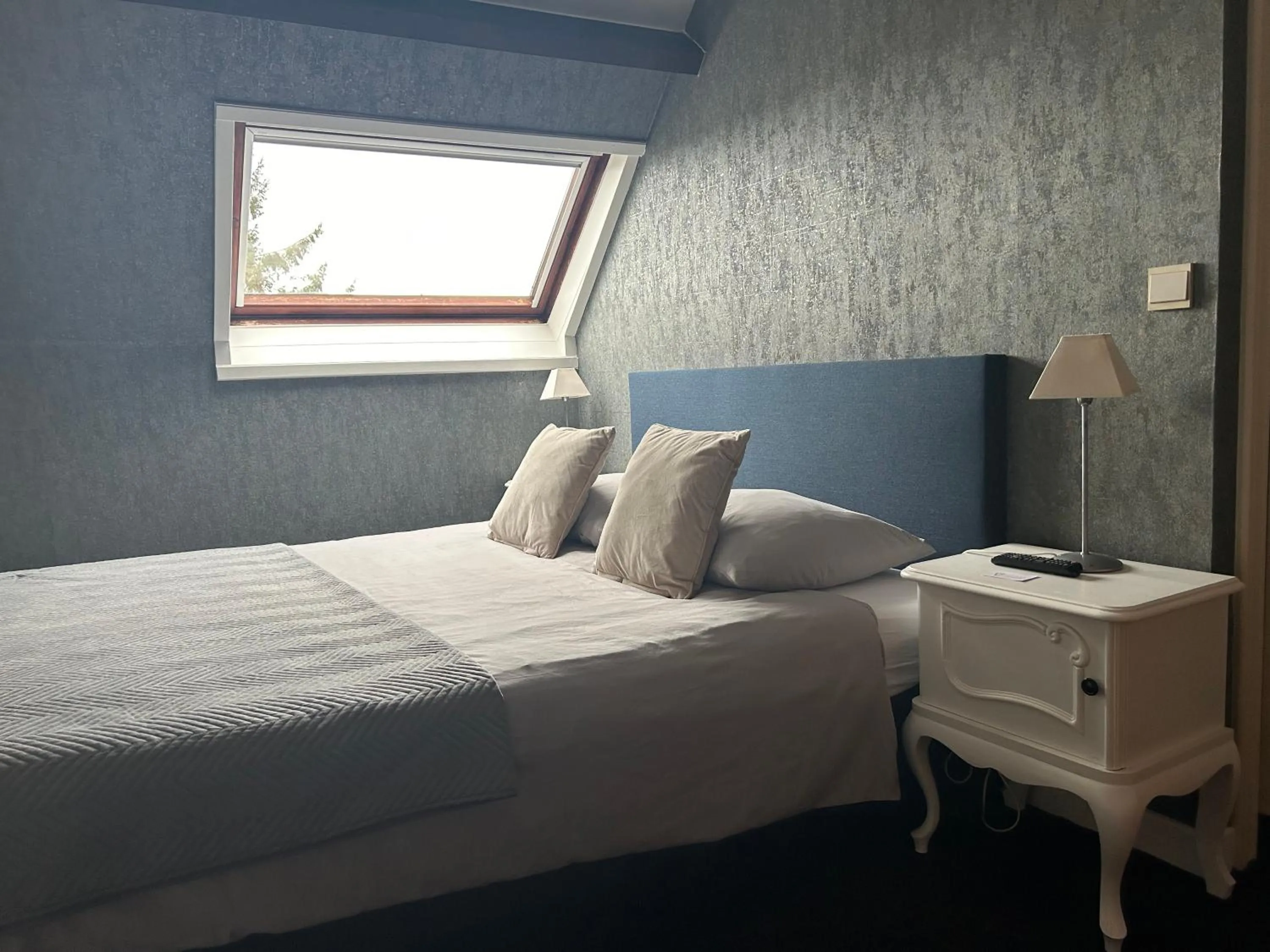 Bed in Hotel Vredehof