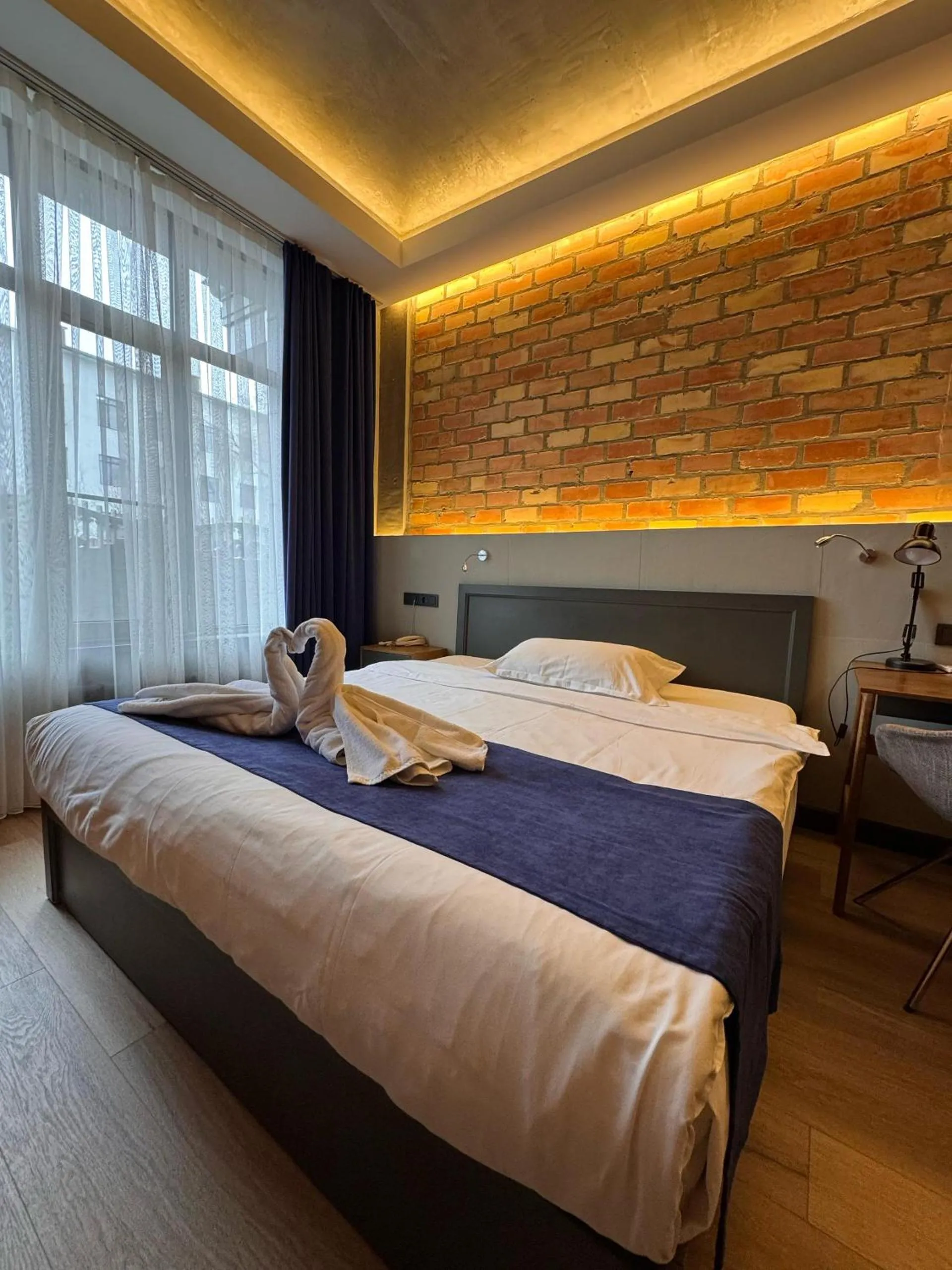 Bed in Bugu Hotel Bishkek