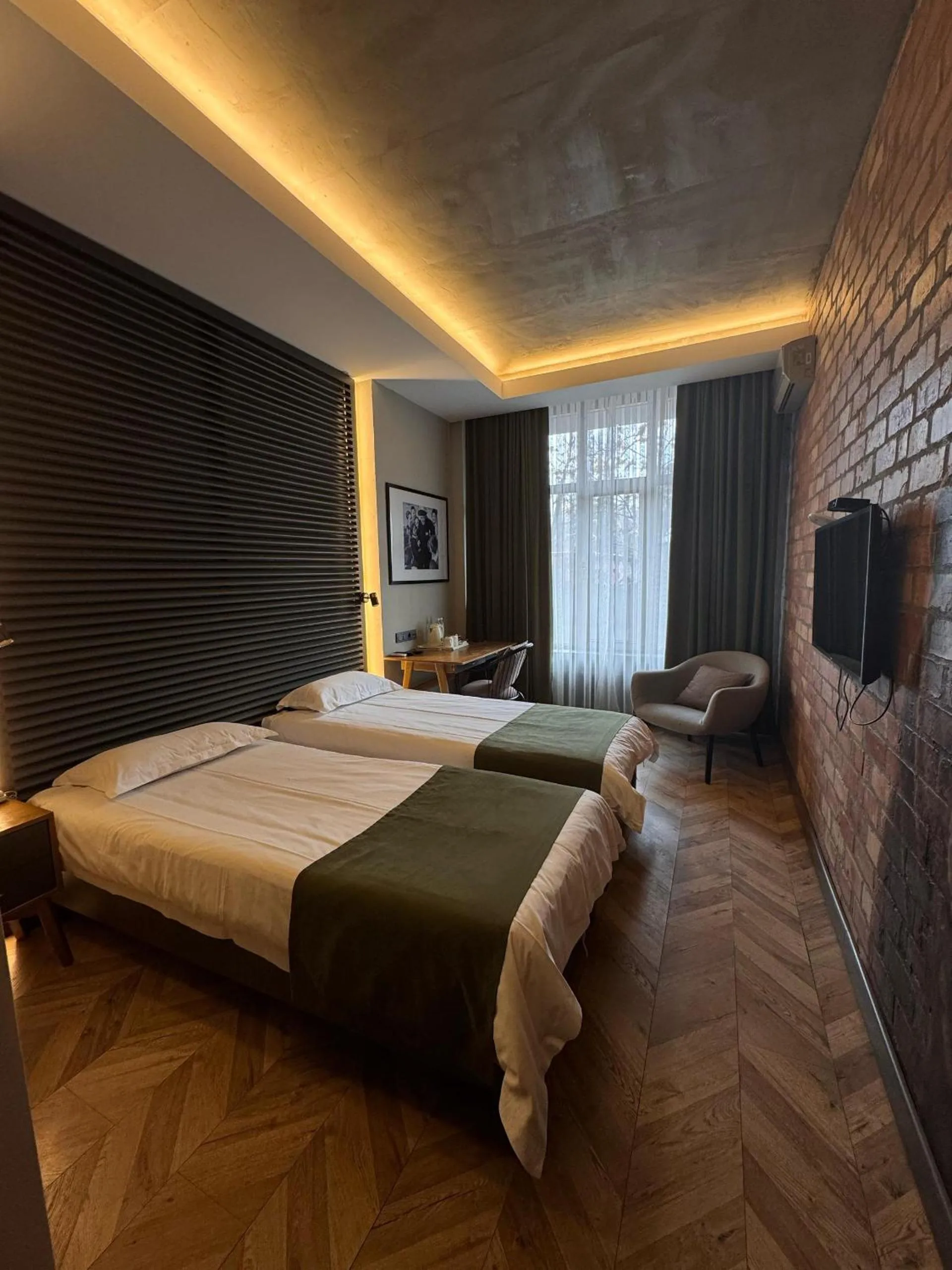 Bed in Bugu Hotel Bishkek