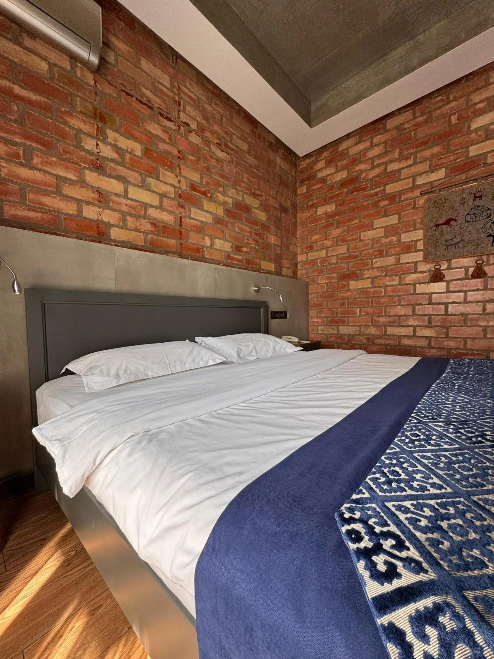 Bed in Bugu Hotel Bishkek