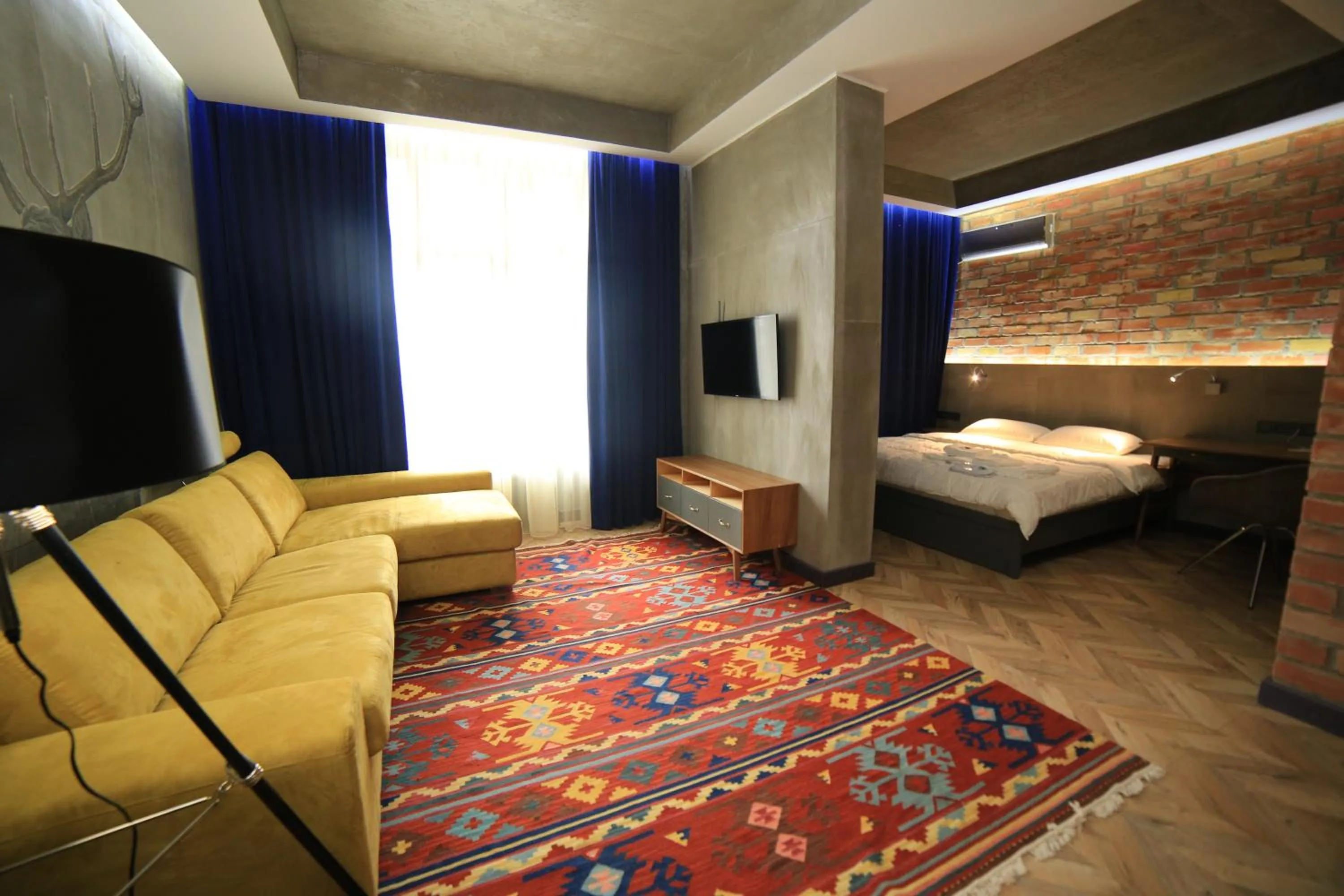 Photo of the whole room, Bed in Bugu Hotel Bishkek