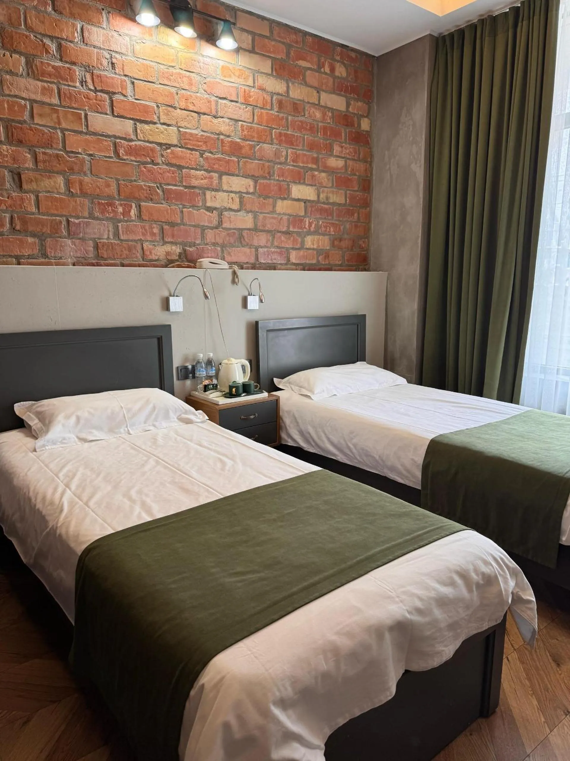 Bed in Bugu Hotel Bishkek