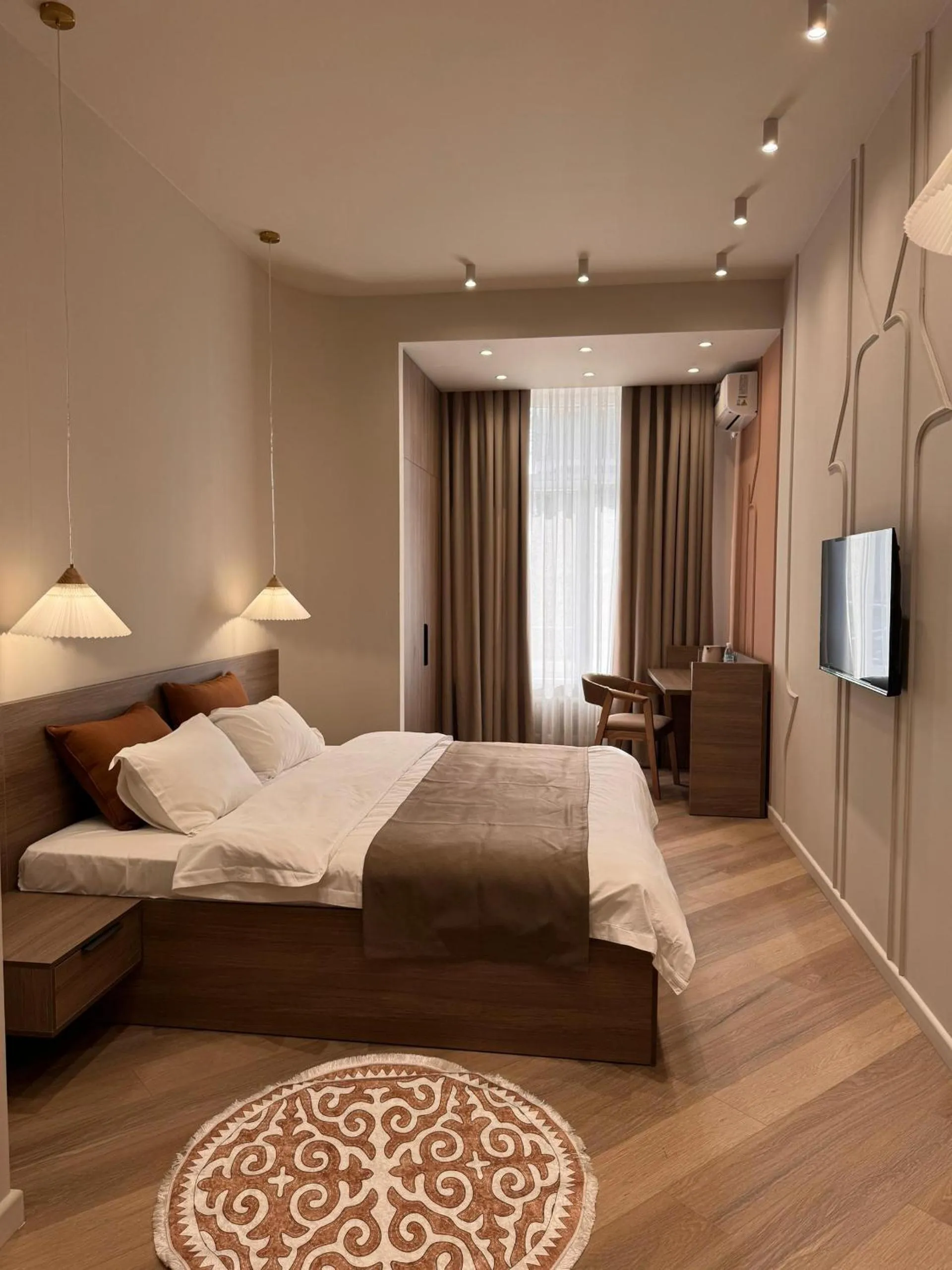 Bed in Bugu Hotel Bishkek