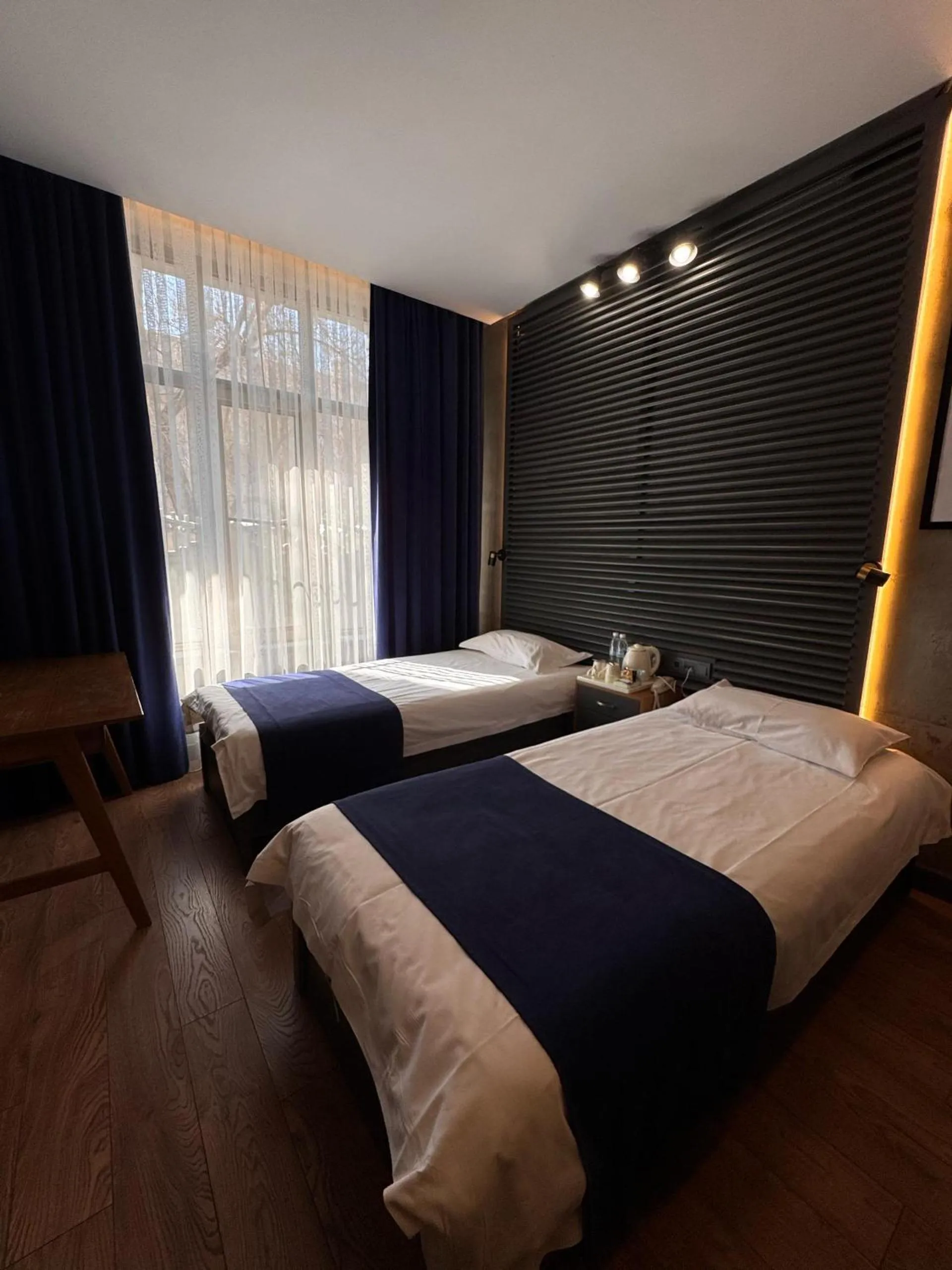 Bed in Bugu Hotel Bishkek