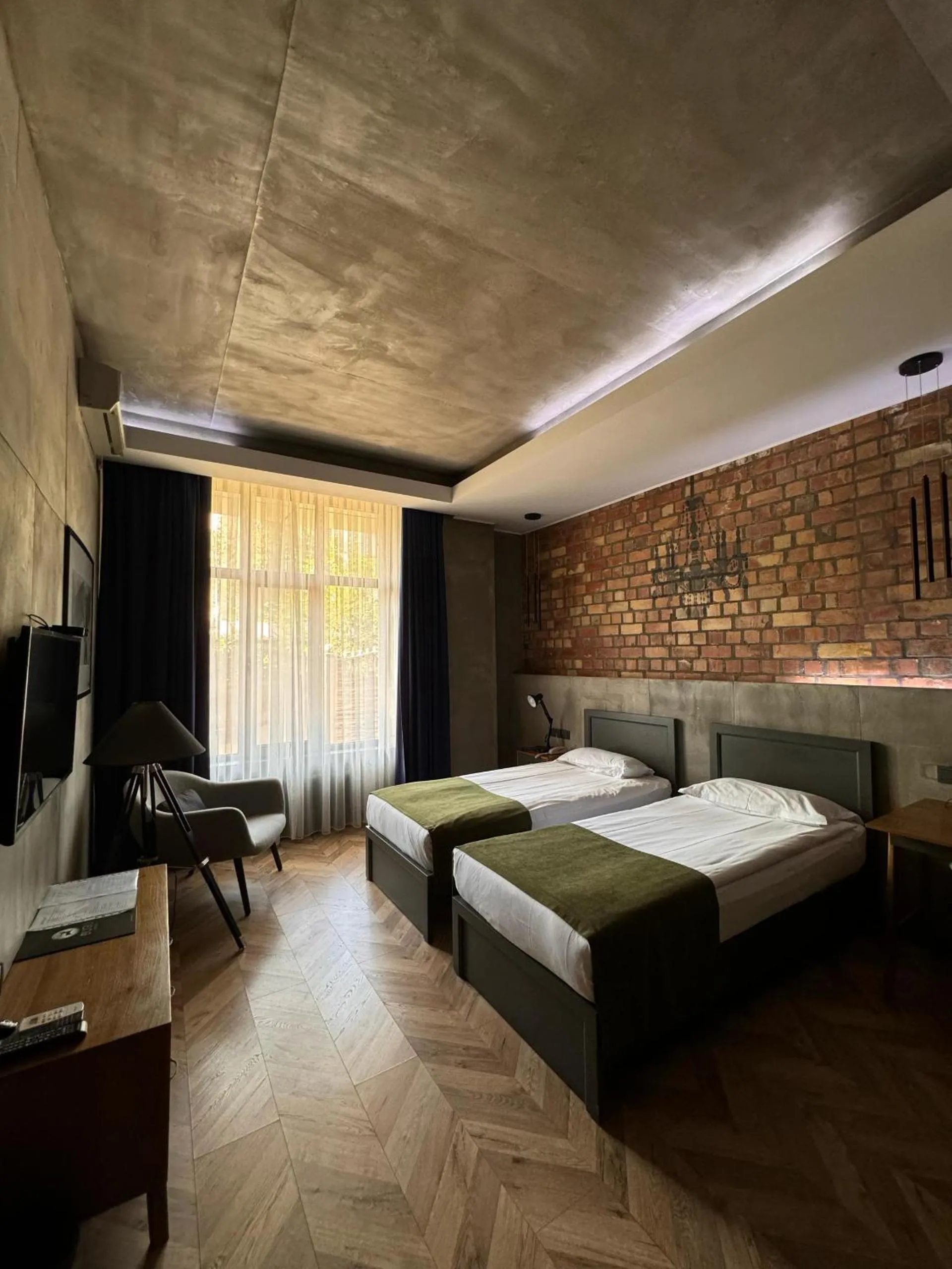 Bed in Bugu Hotel Bishkek